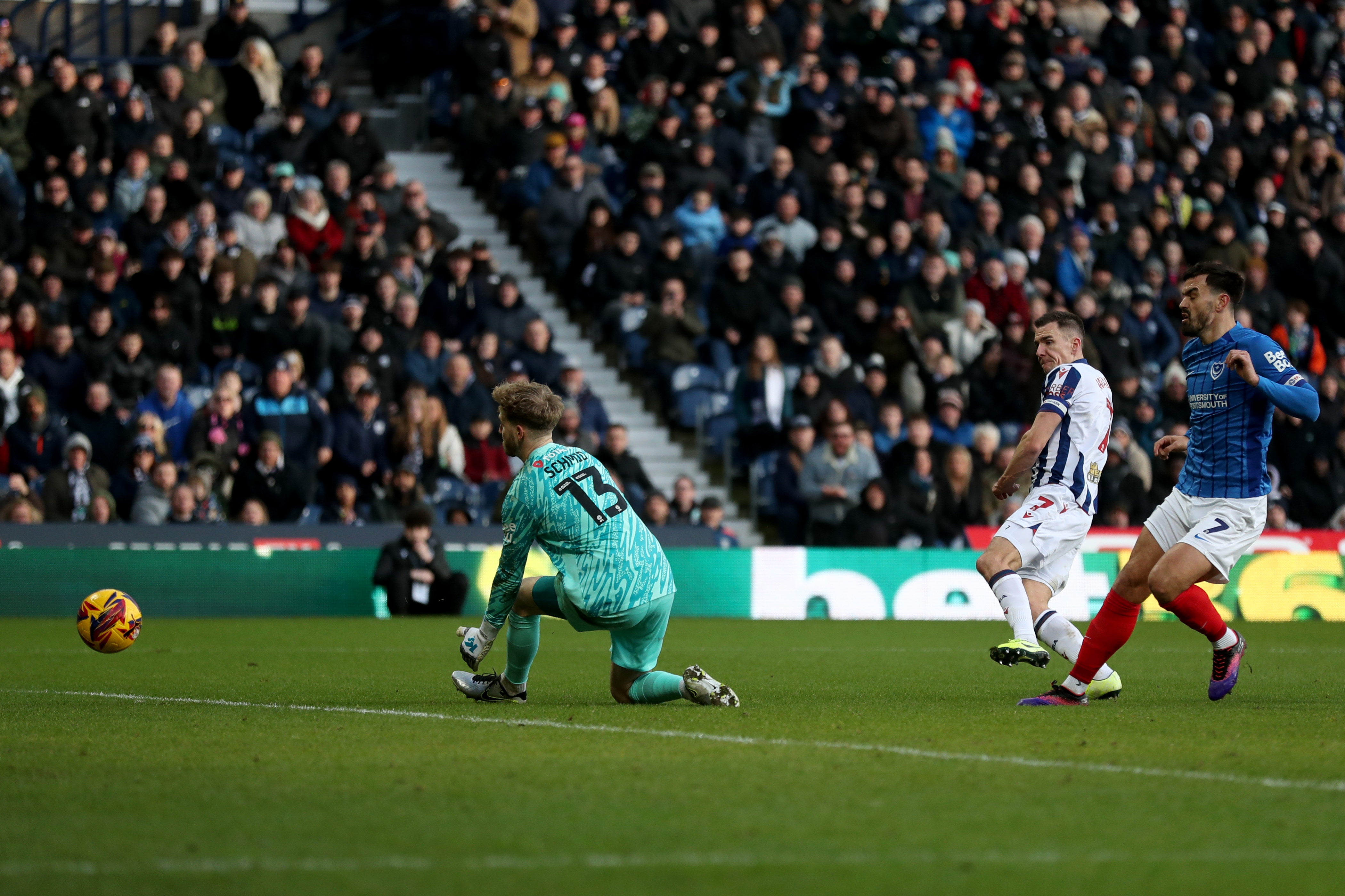 Jed Wallace shoots and scores against Portsmouth at The Hawthorns