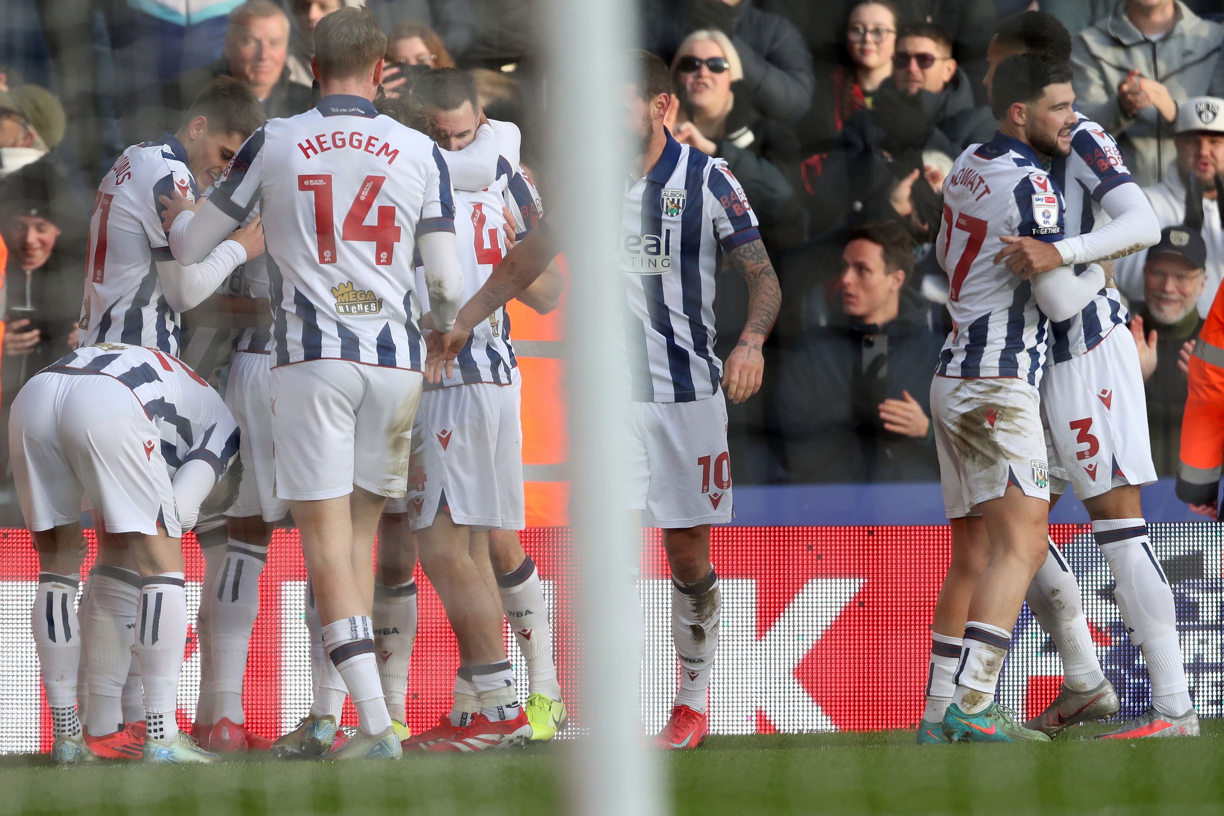 Jed Wallace celebrates scoring against Portsmouth at The Hawthorns with team-mates