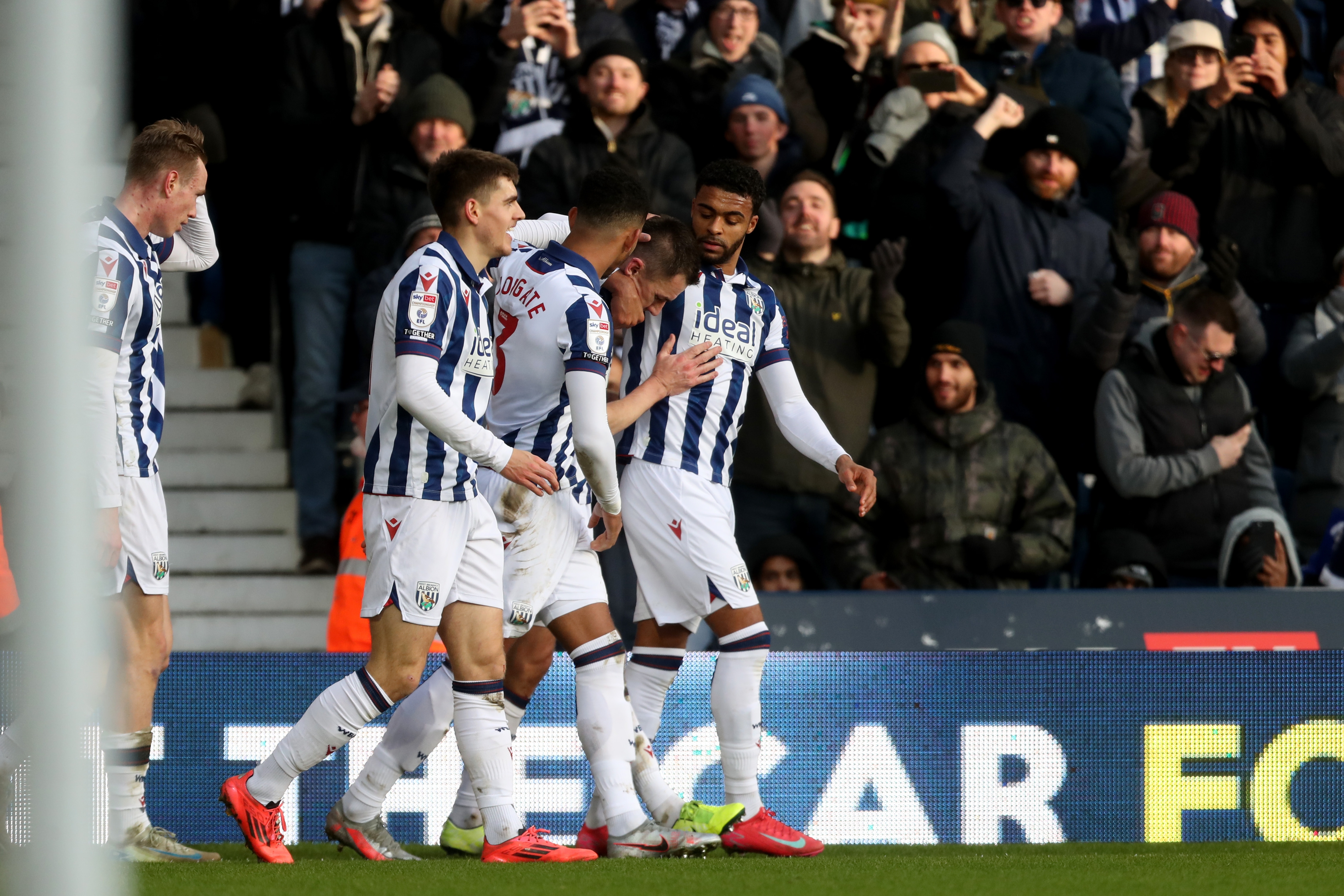 Jed Wallace celebrates scoring against Portsmouth at The Hawthorns with team-mates