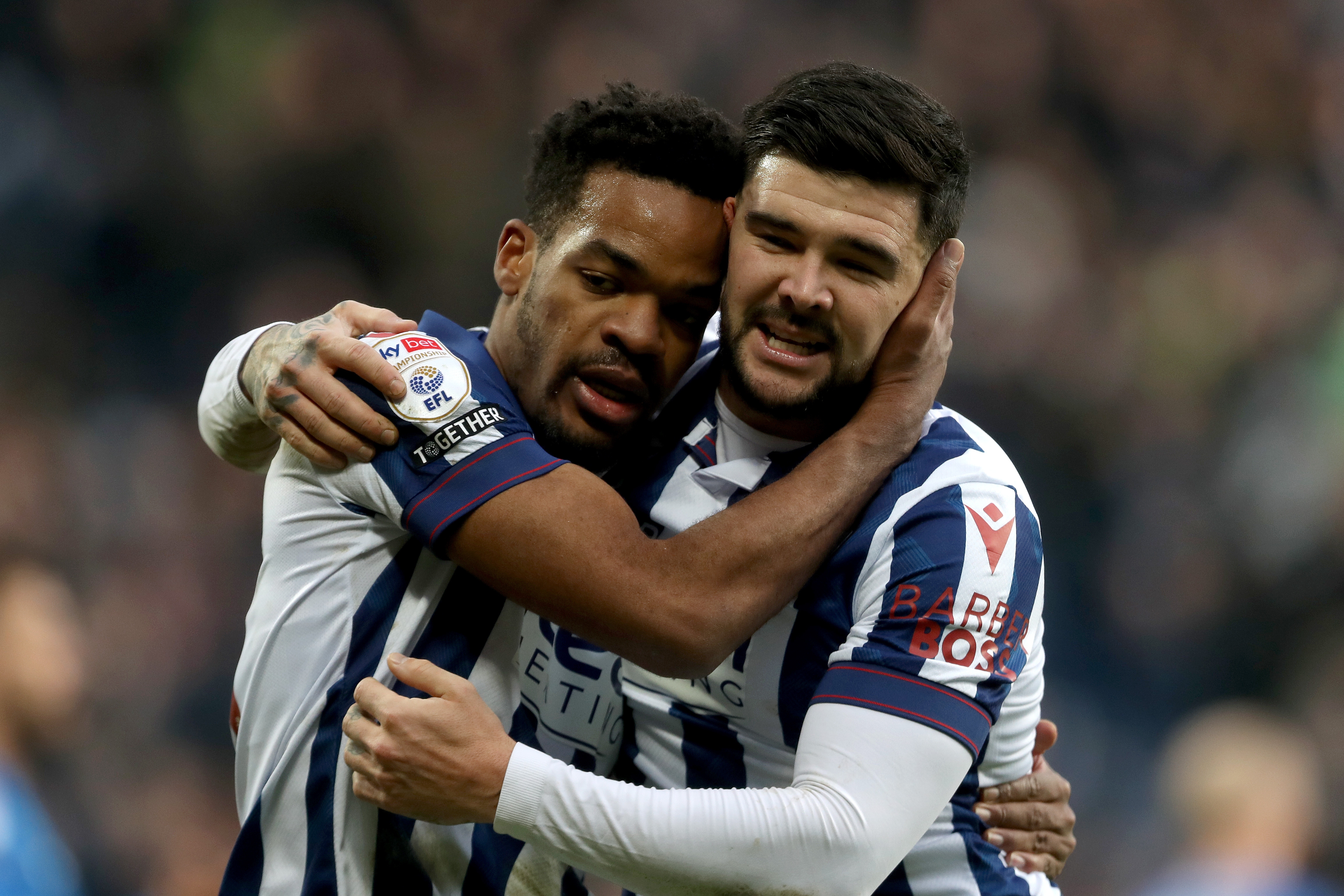 Grady Diangana celebrates scoring against Portsmouth with Alex Mowatt