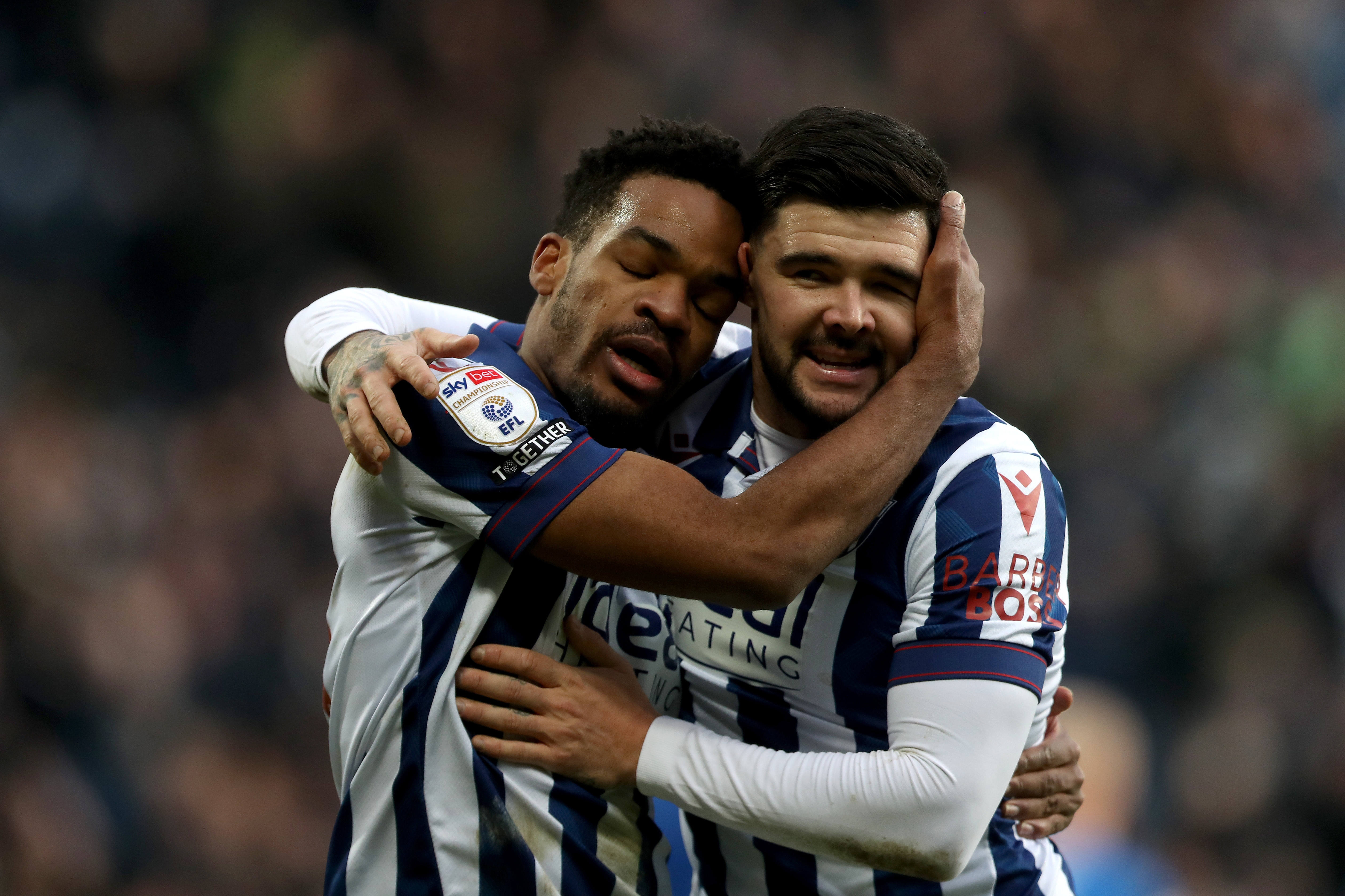 Grady Diangana celebrates scoring against Portsmouth with Alex Mowatt