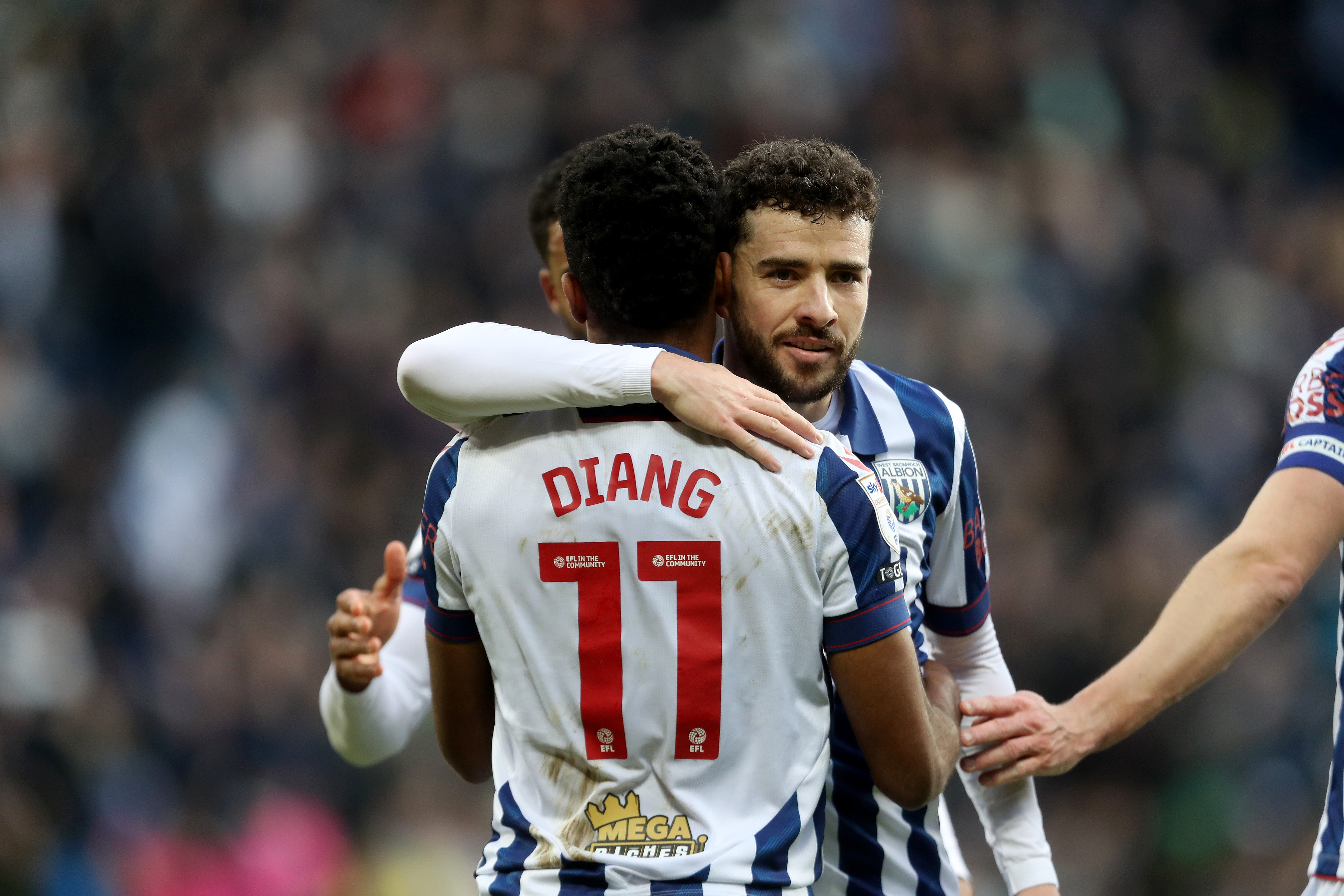 Grady Diangana celebrates scoring against Portsmouth with Mikey Johnston