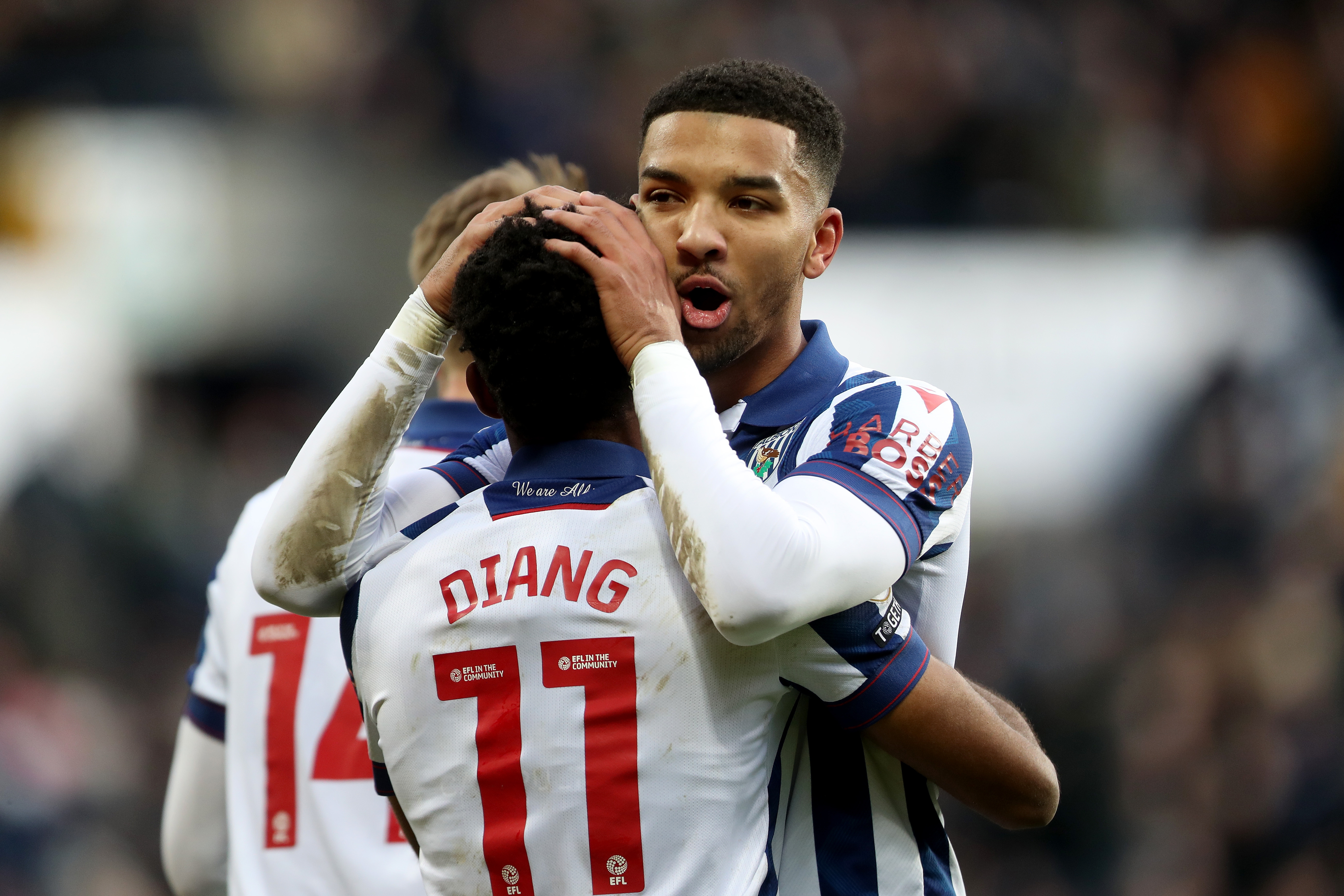 Grady Diangana celebrates scoring against Portsmouth with Mason Holgate