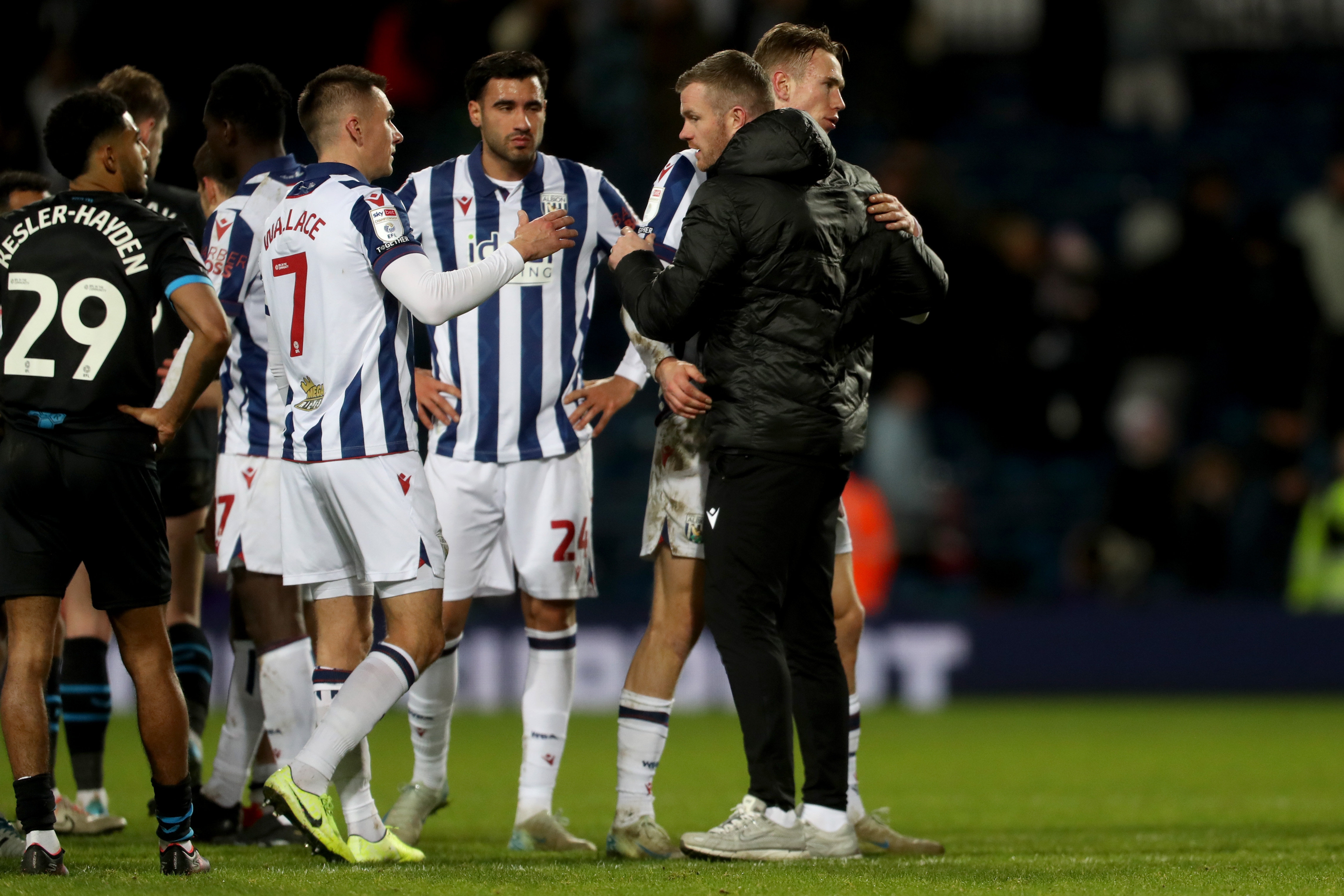 Chris Brunt congratulating the players after the win over Preston 