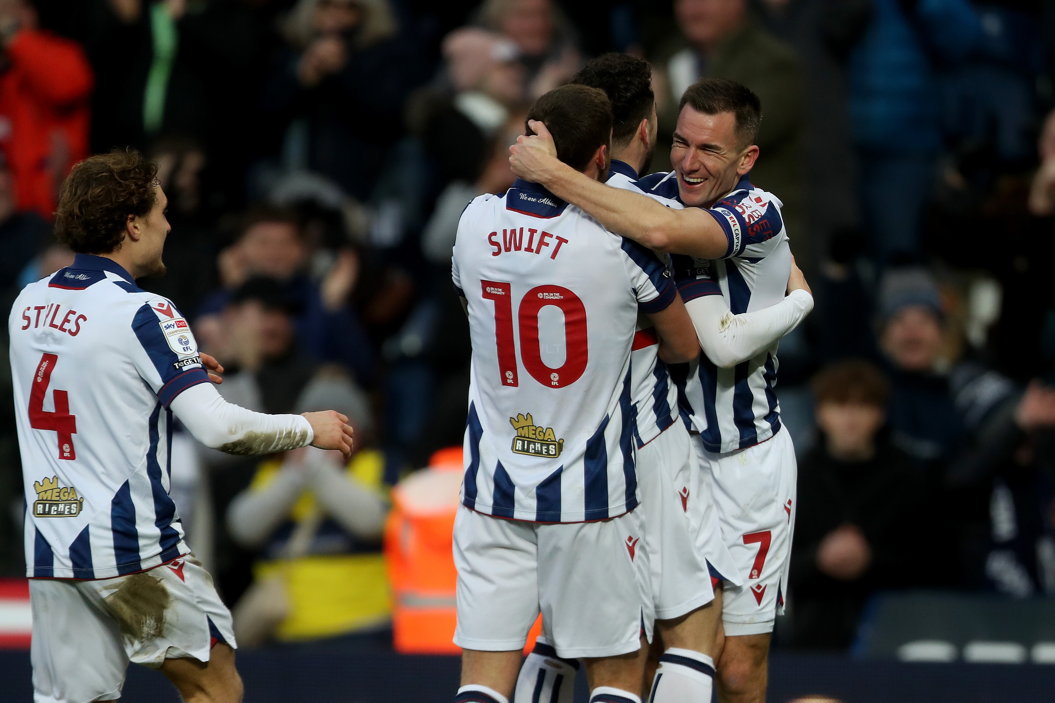 John Swift celebrates scoring against Portsmouth with Jed Wallace