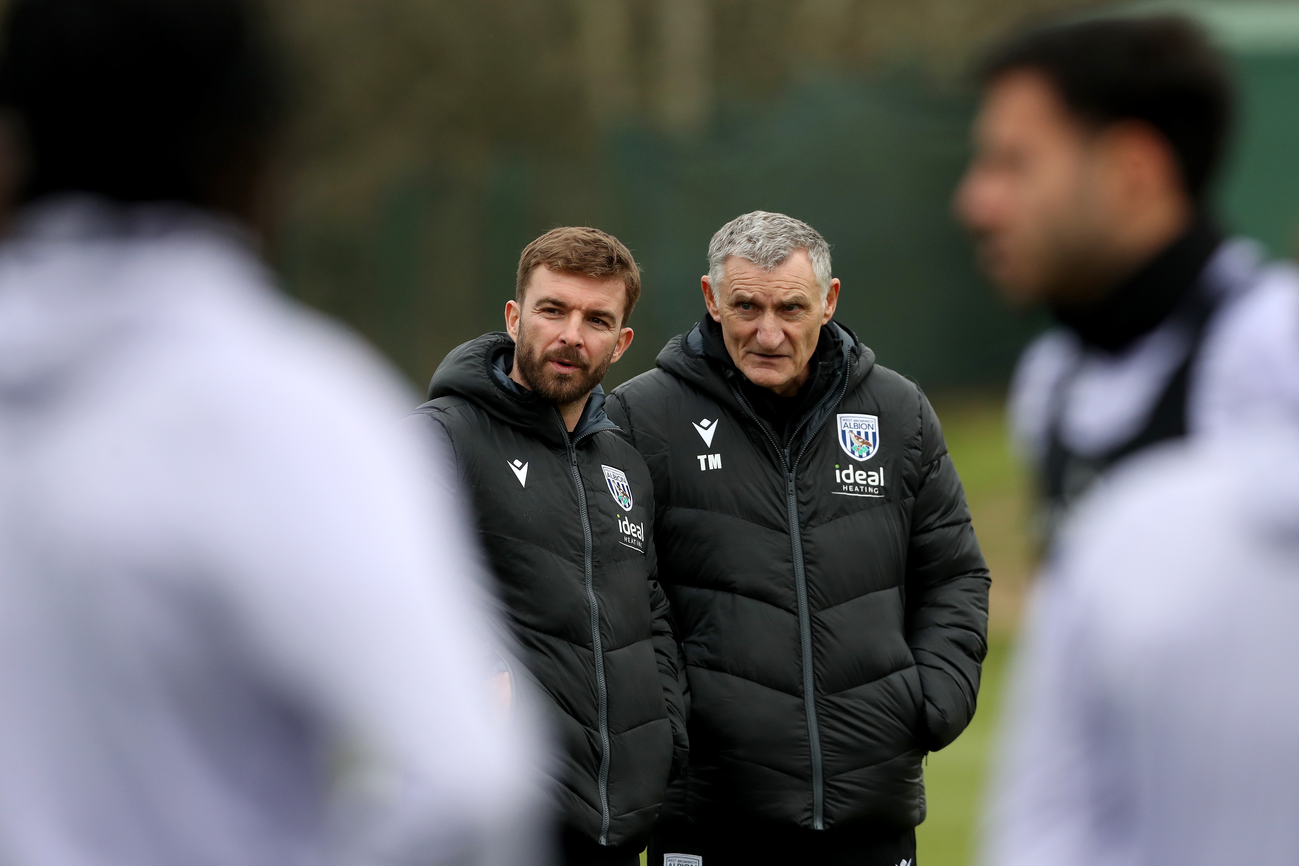 James Morrison stood with Tony Mowbray watching training