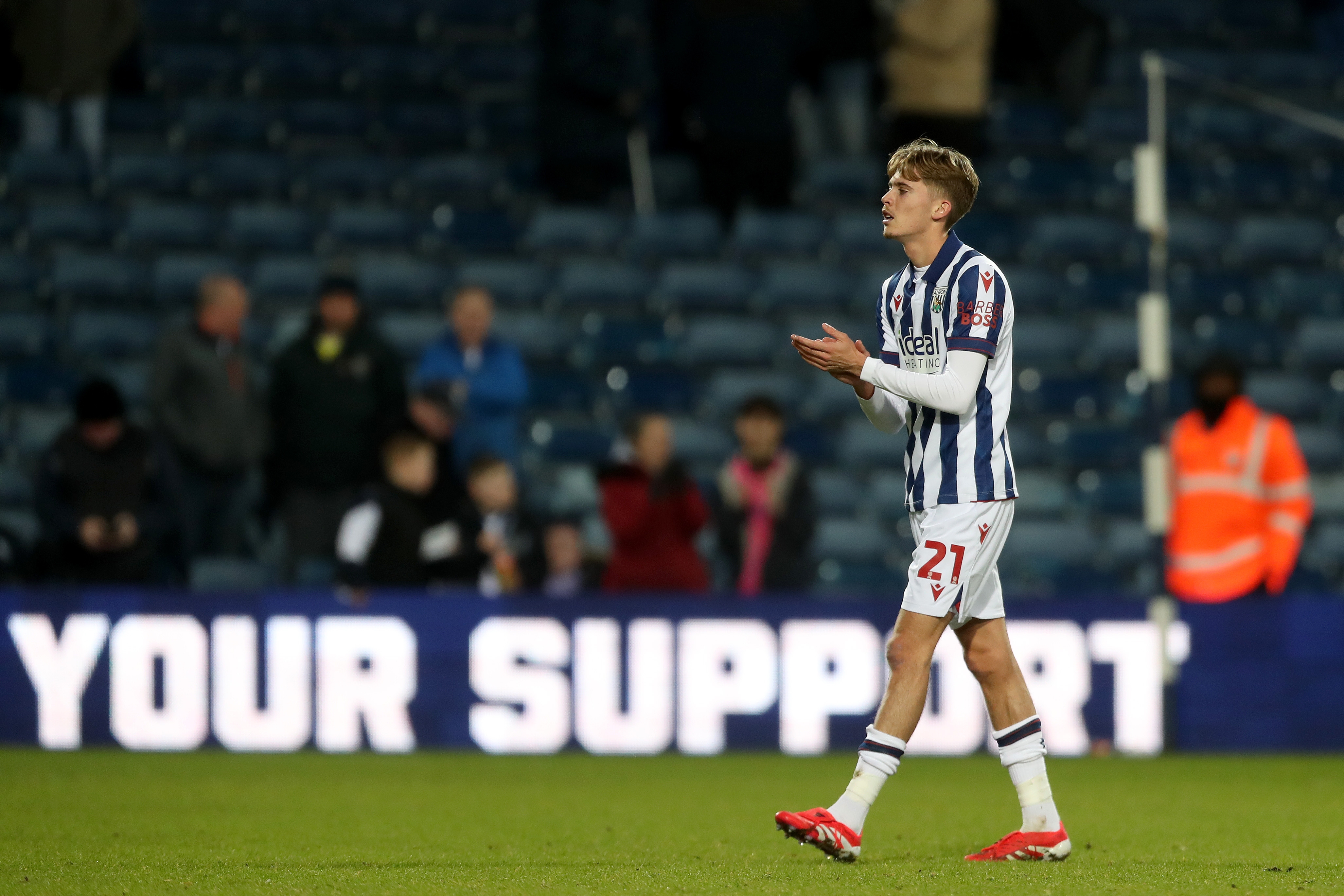 Isaac Price applauding Albion fans after beating Portsmouth