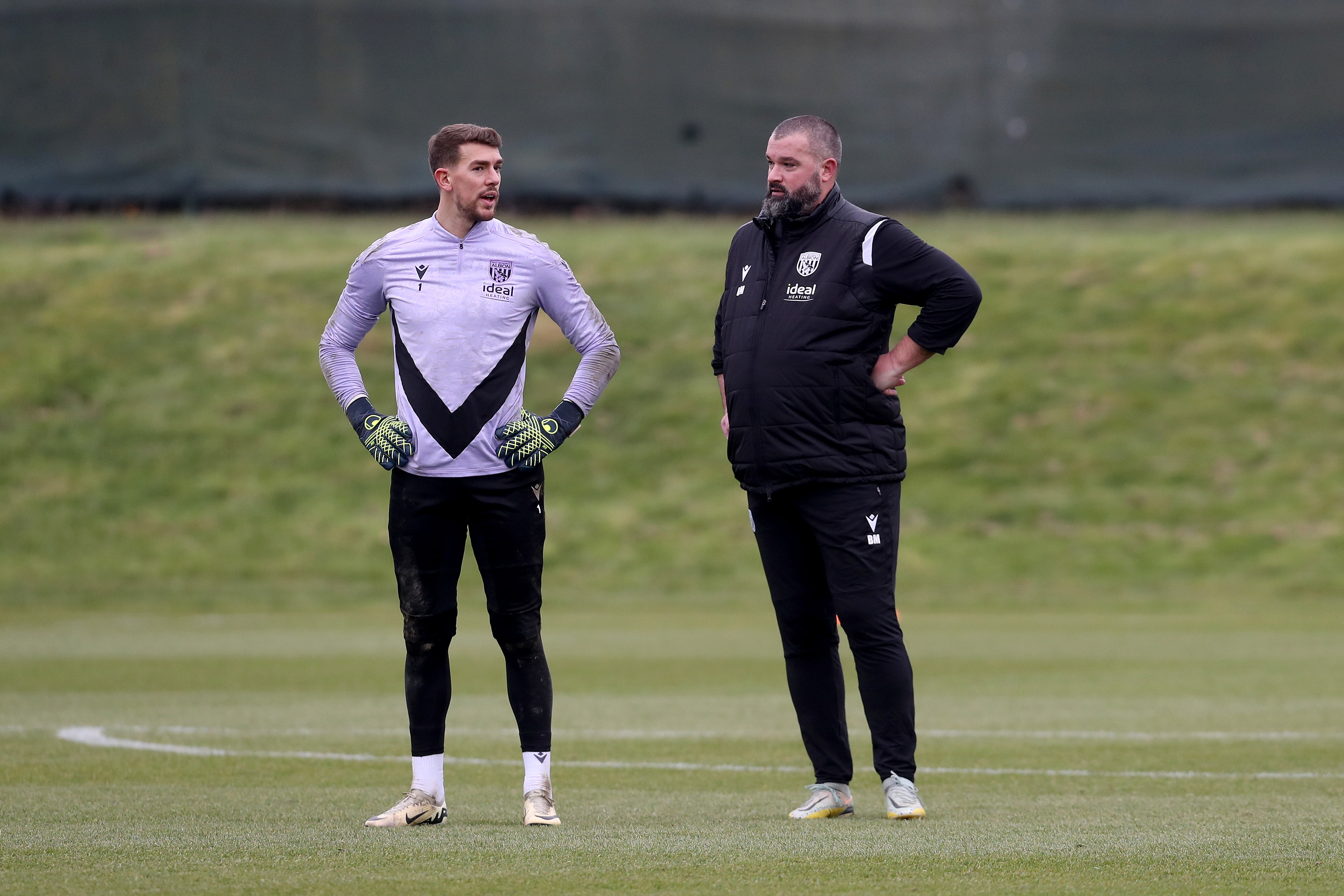 Alex Palmer chatting to Boaz Myhill during a training session