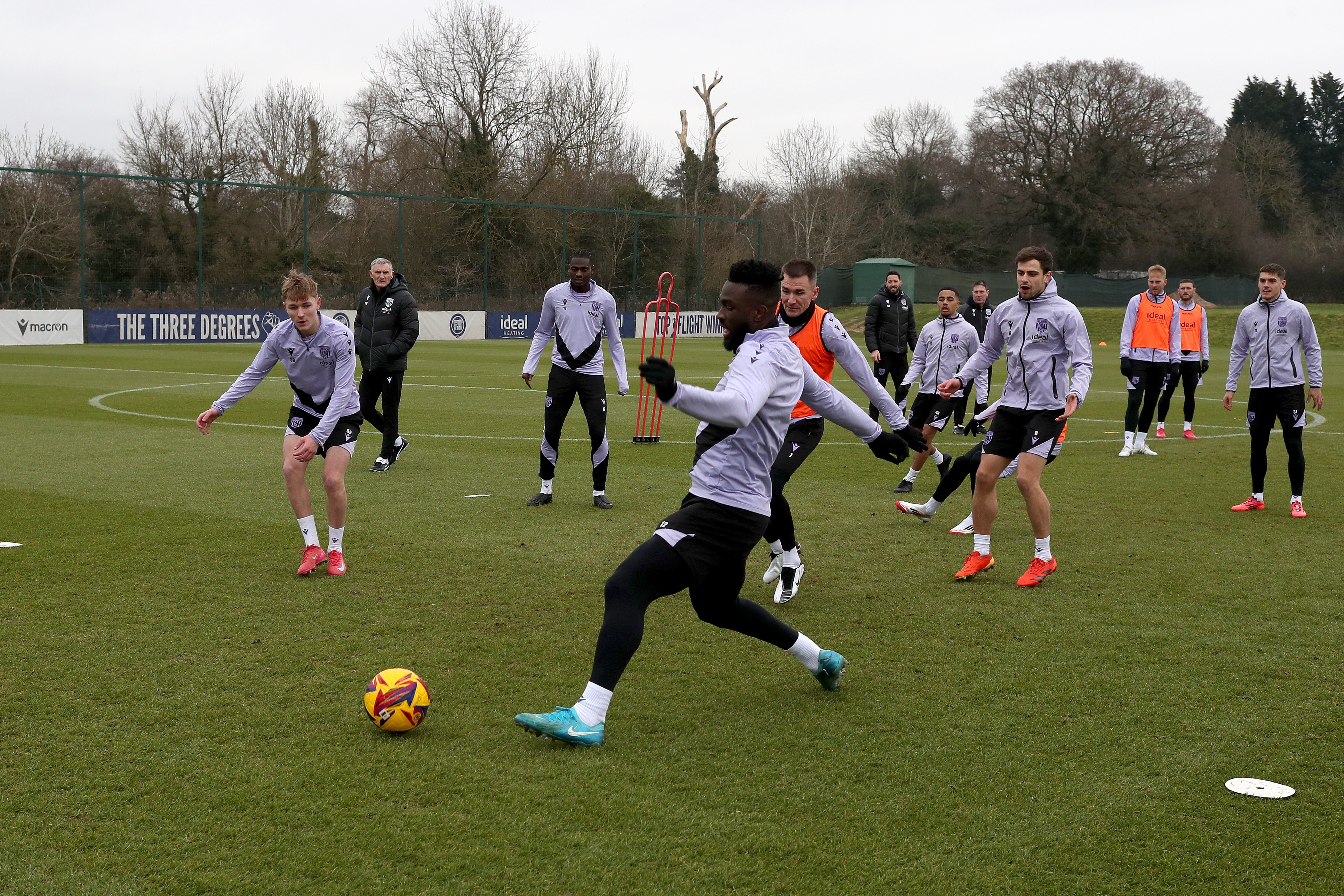 A general view of a training session with Tony Mowbray watching in the background