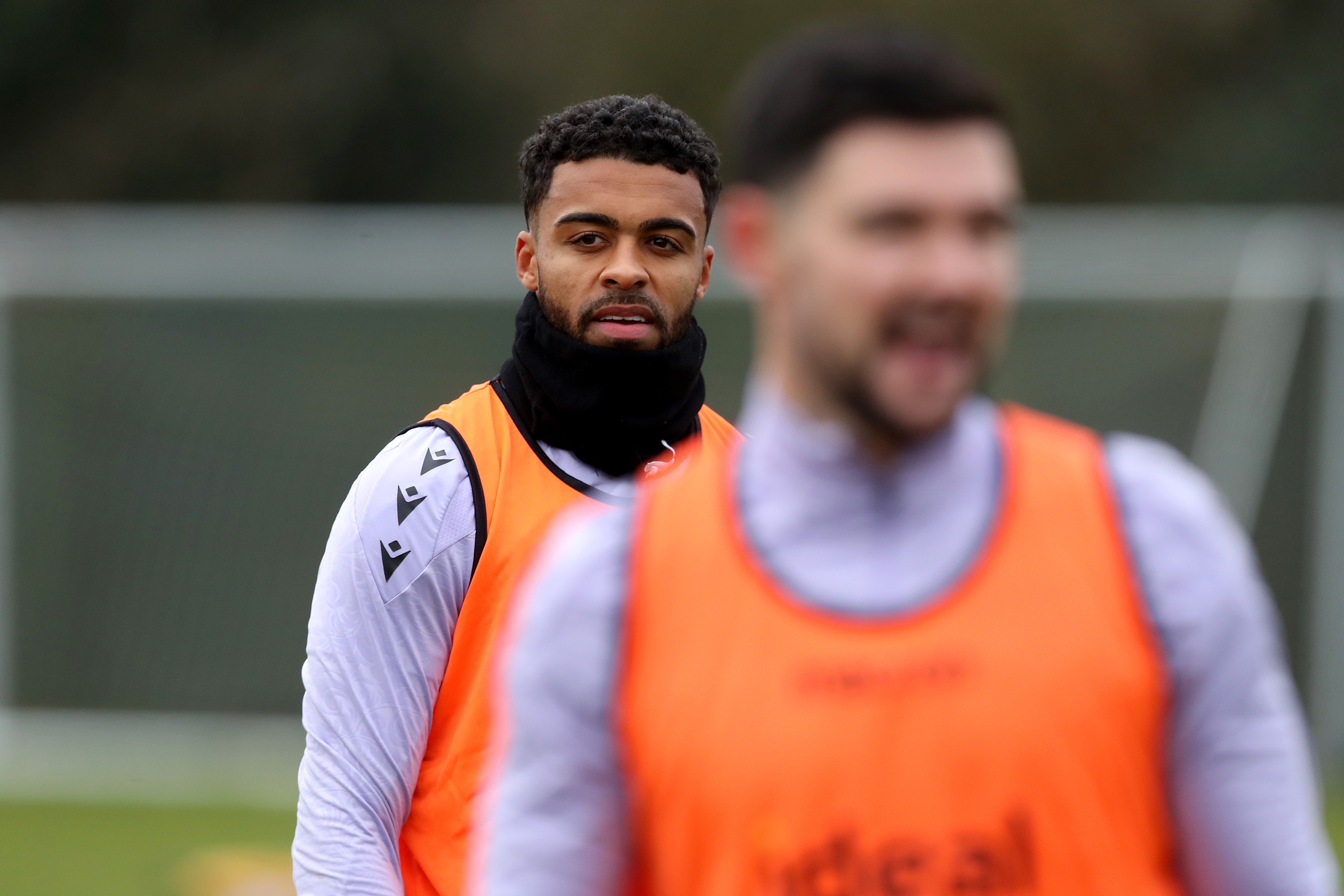 Darnell Furlong and Alex Mowatt wearing orange bibs in training 