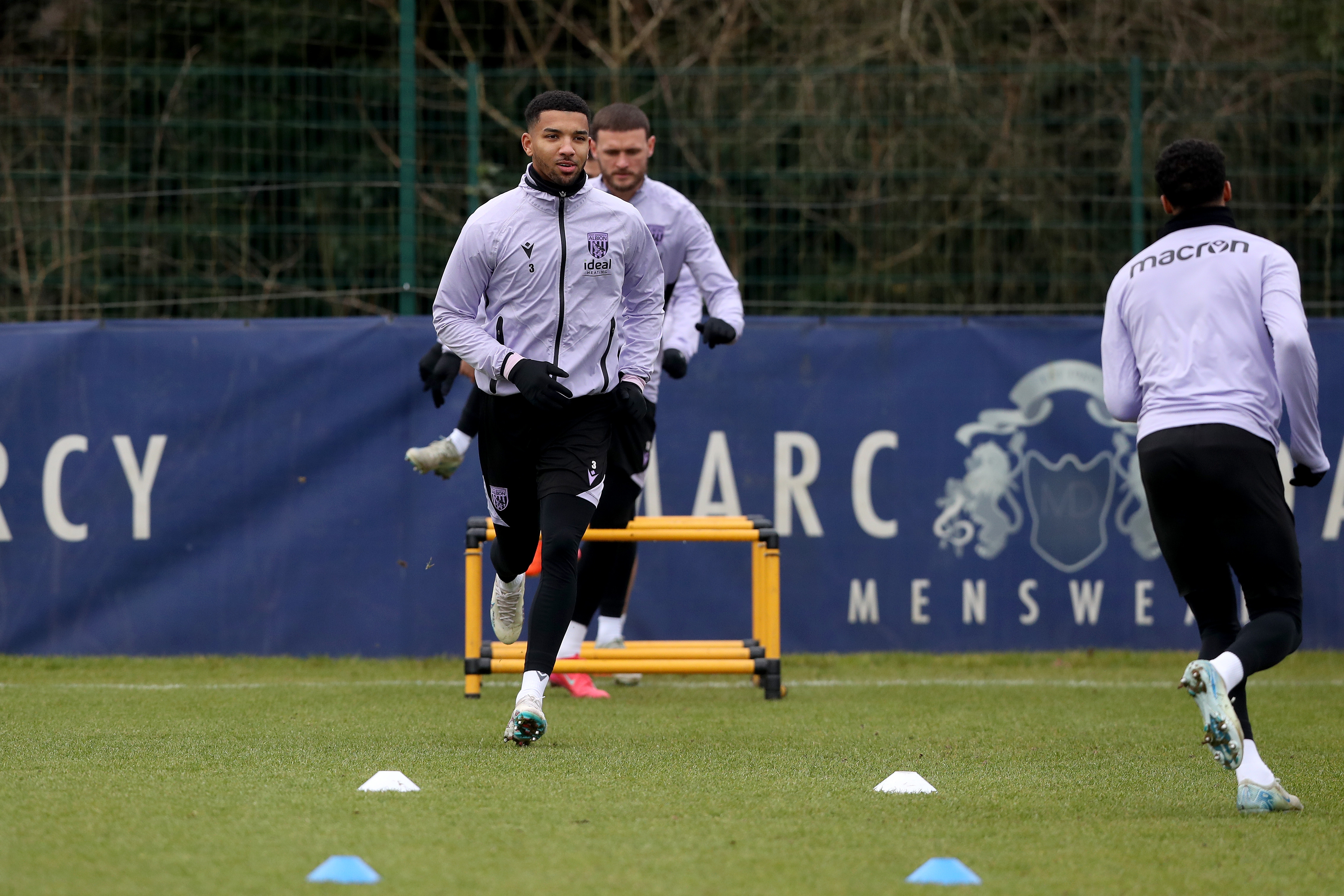 Mason Holgate warming up before a training session