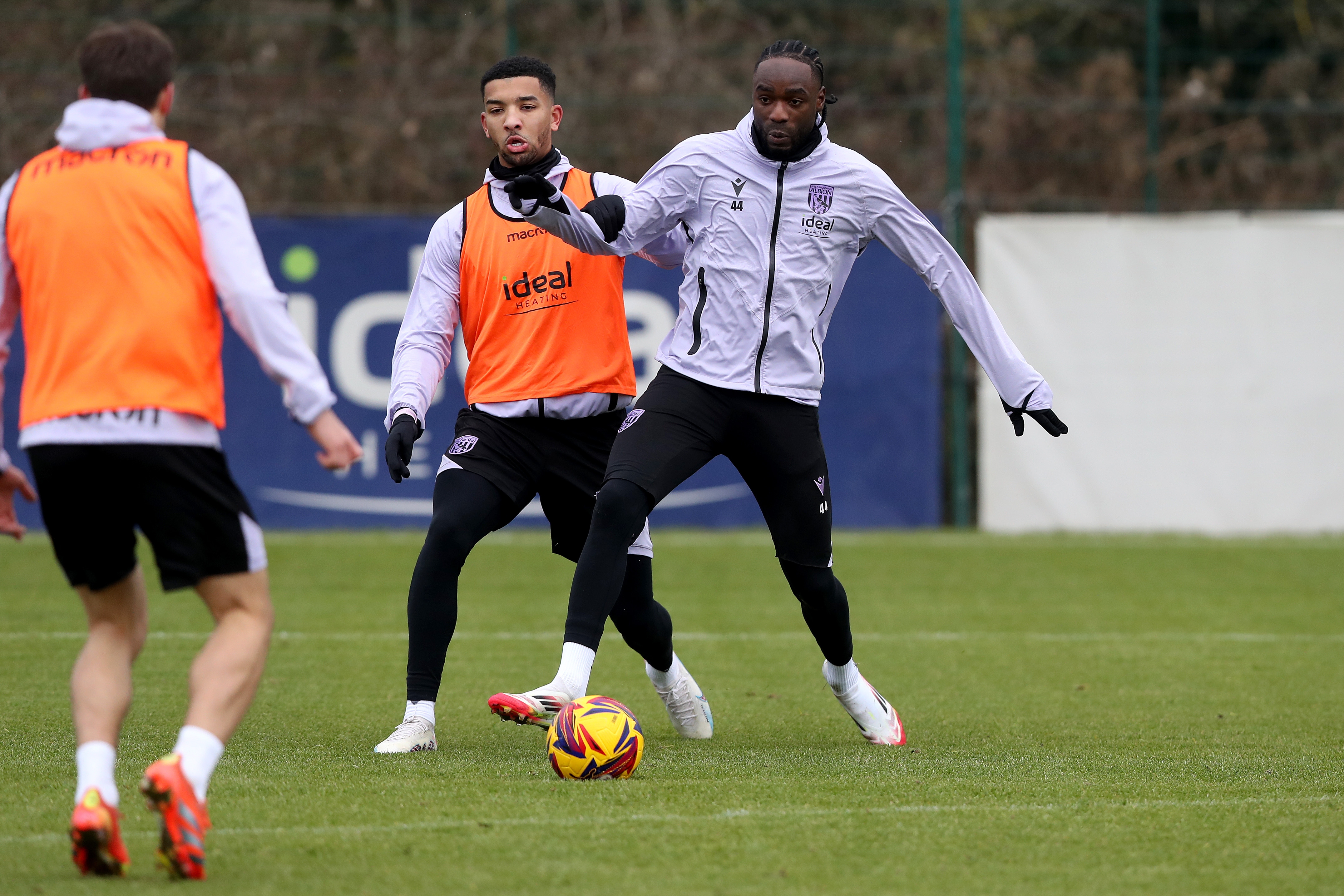 Devante Cole and Mason Holgate battling for the ball during a training session