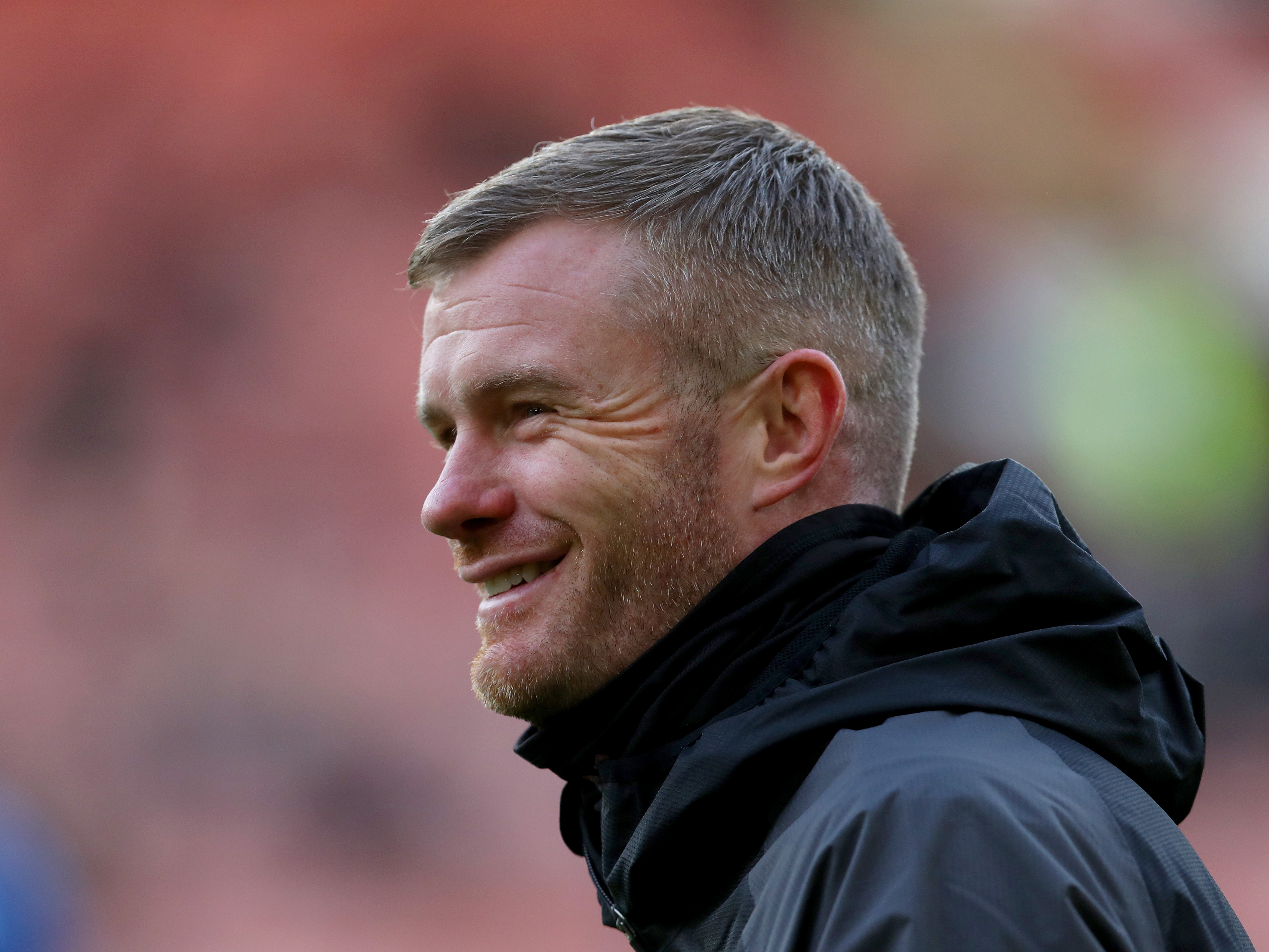 An image of Chris Brunt smiling