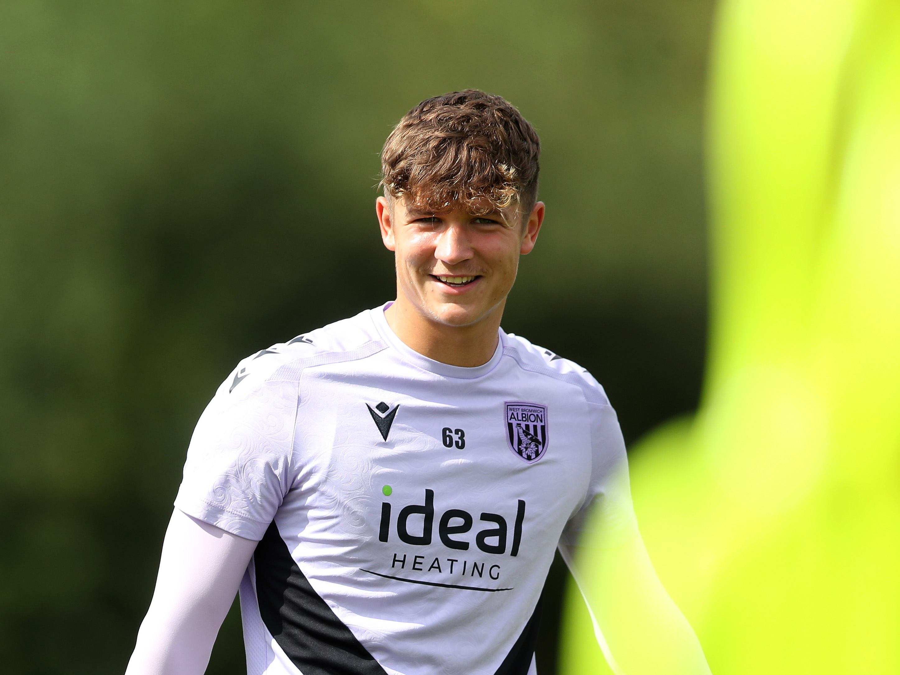 A photo of Albion youngster Cole Deeming in the 2024/25 purple training kit