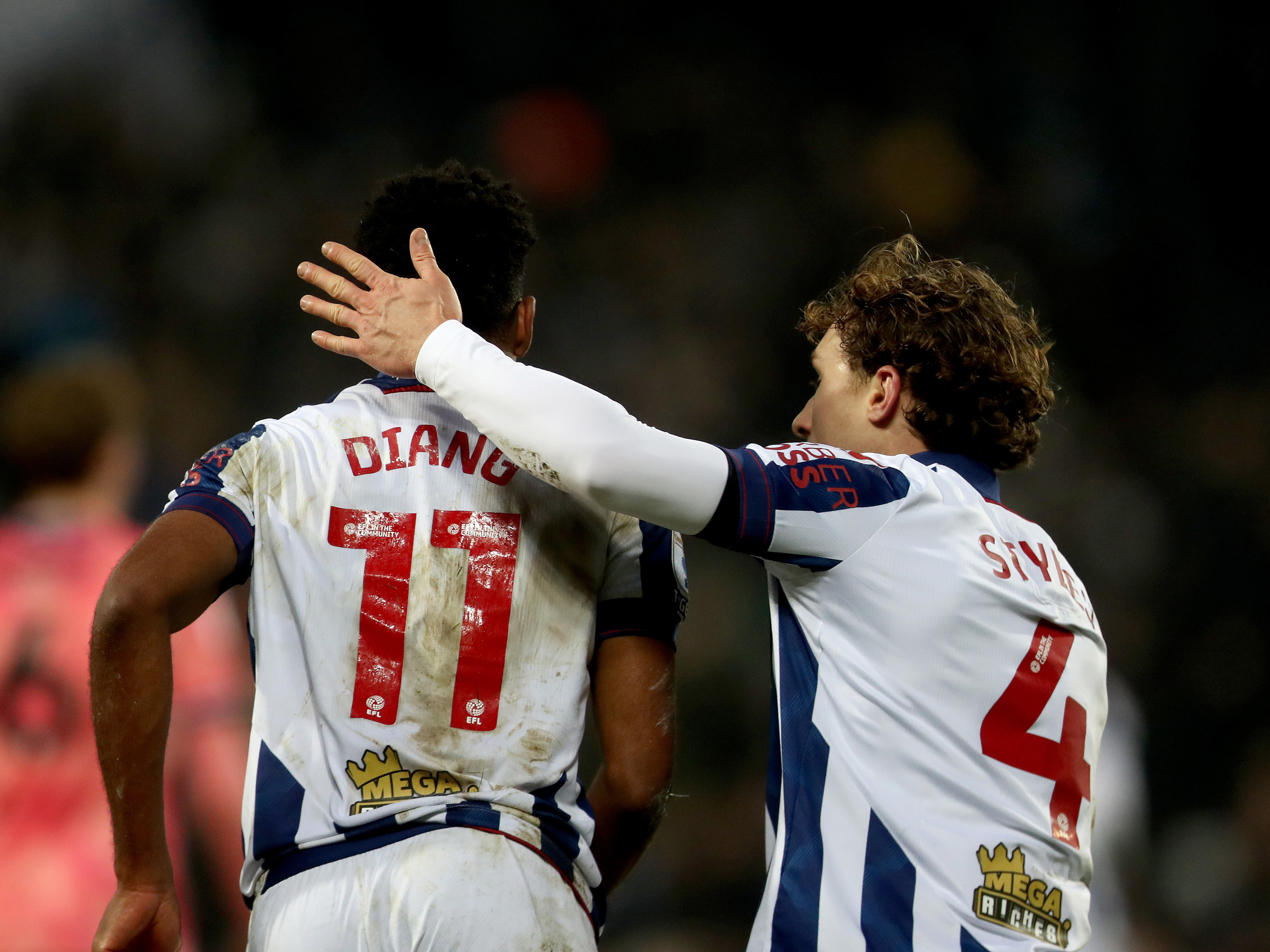 An image of Grady Diangana and Callum Styles celebrating a goal against Stoke