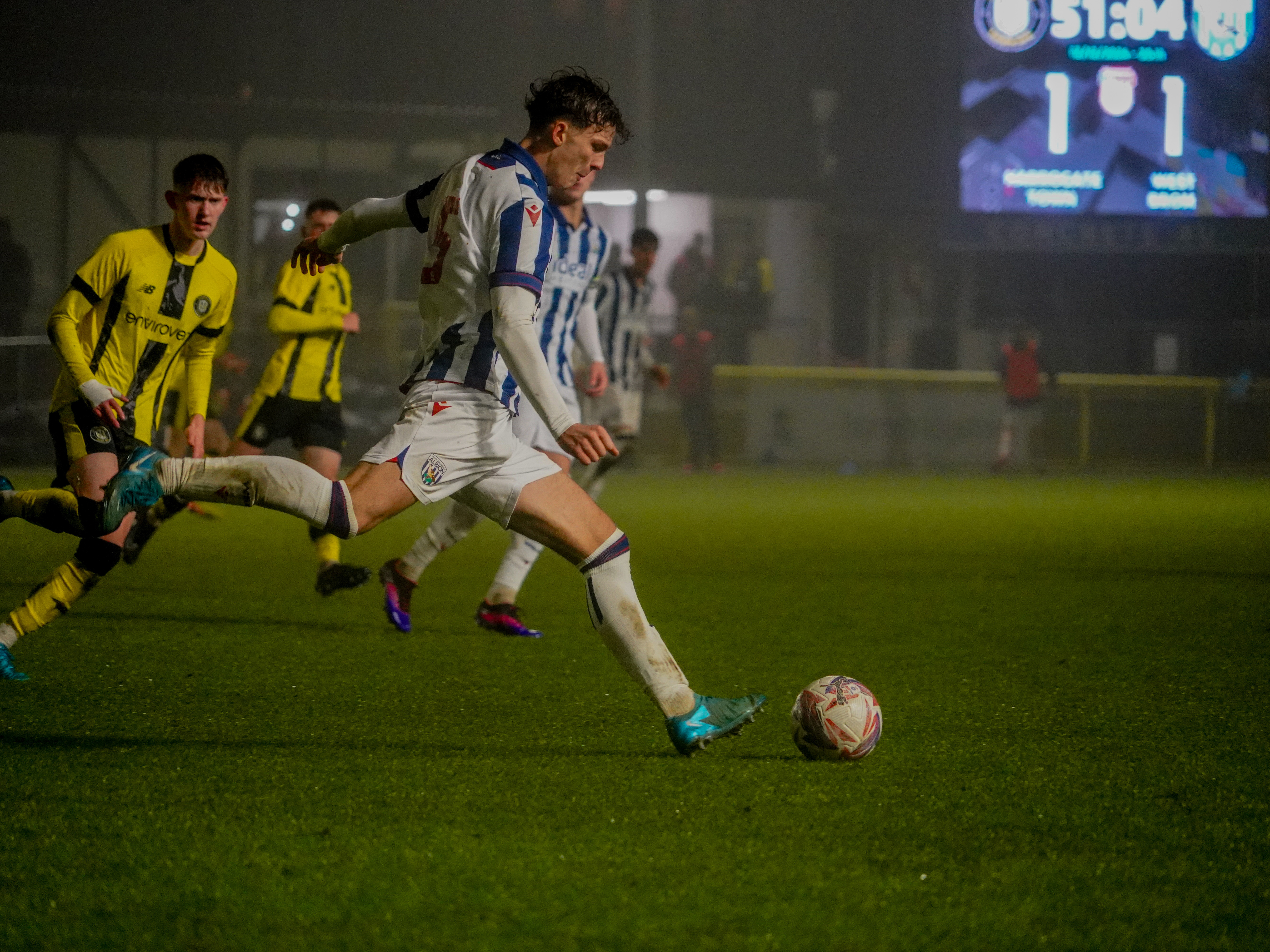 A photo of Albion U18 defender Noah Dupont in the 2024/25 home kit