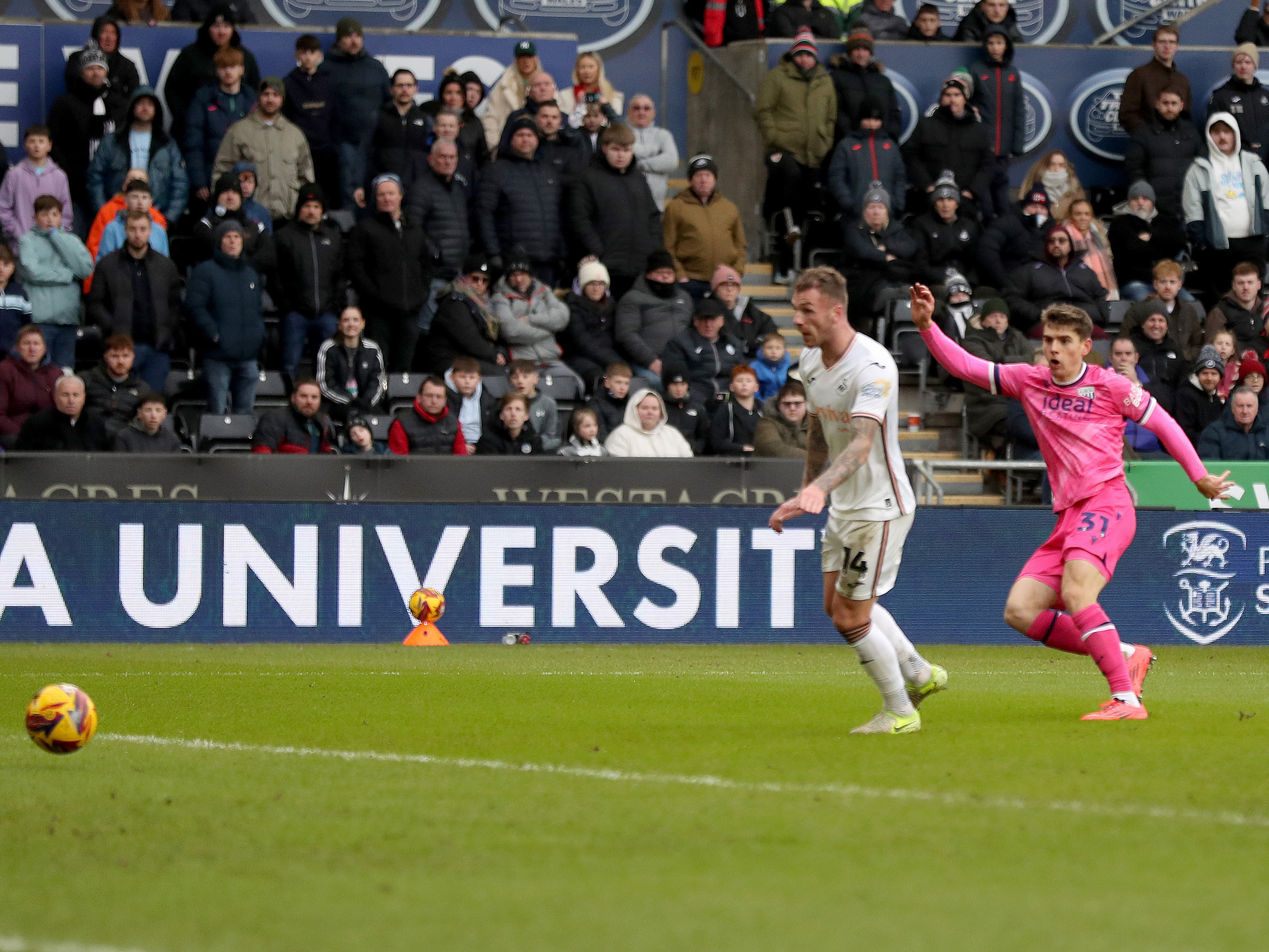 An image of Tom Fellows scoring against Swansea