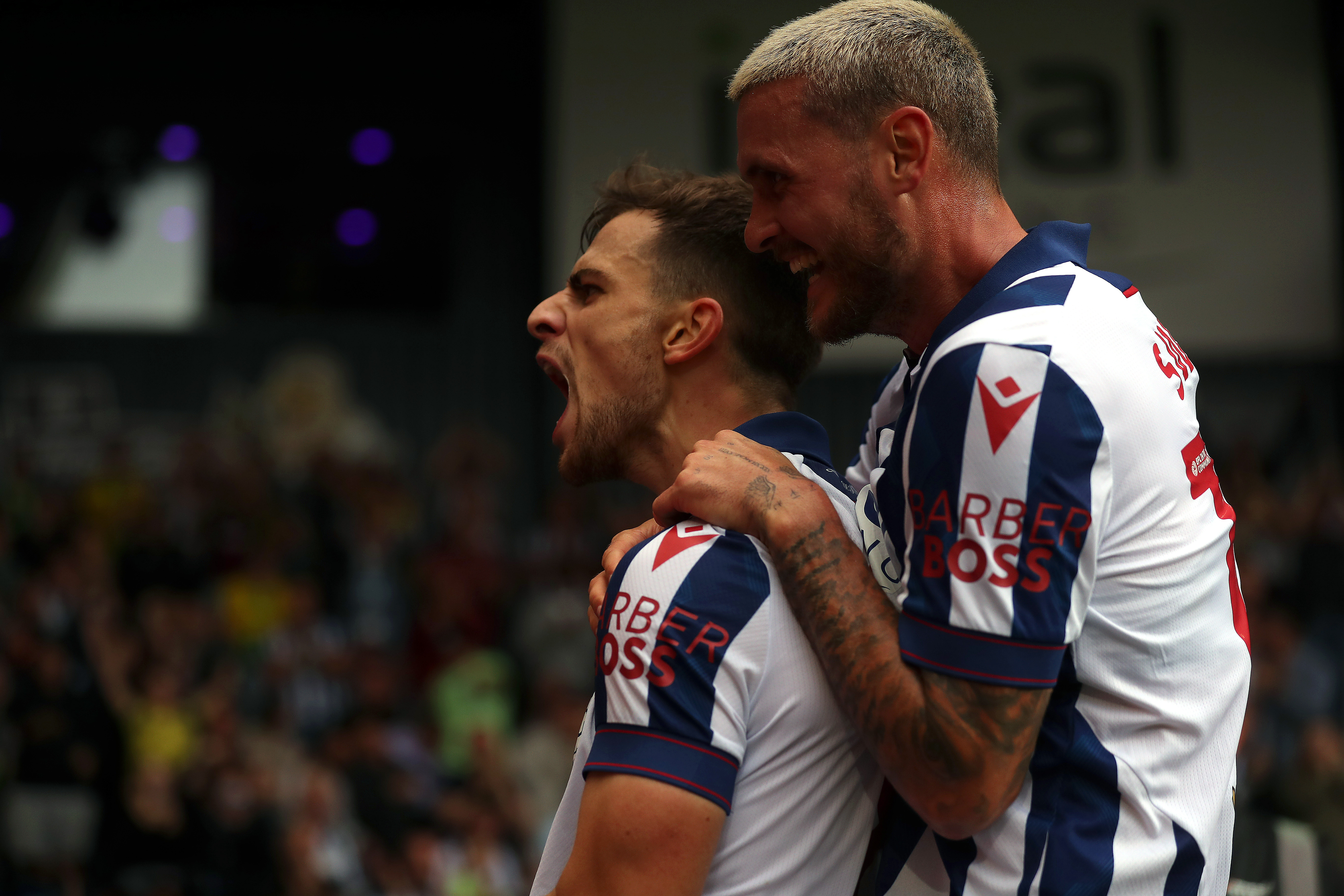 Jayson Molumby celebrates.