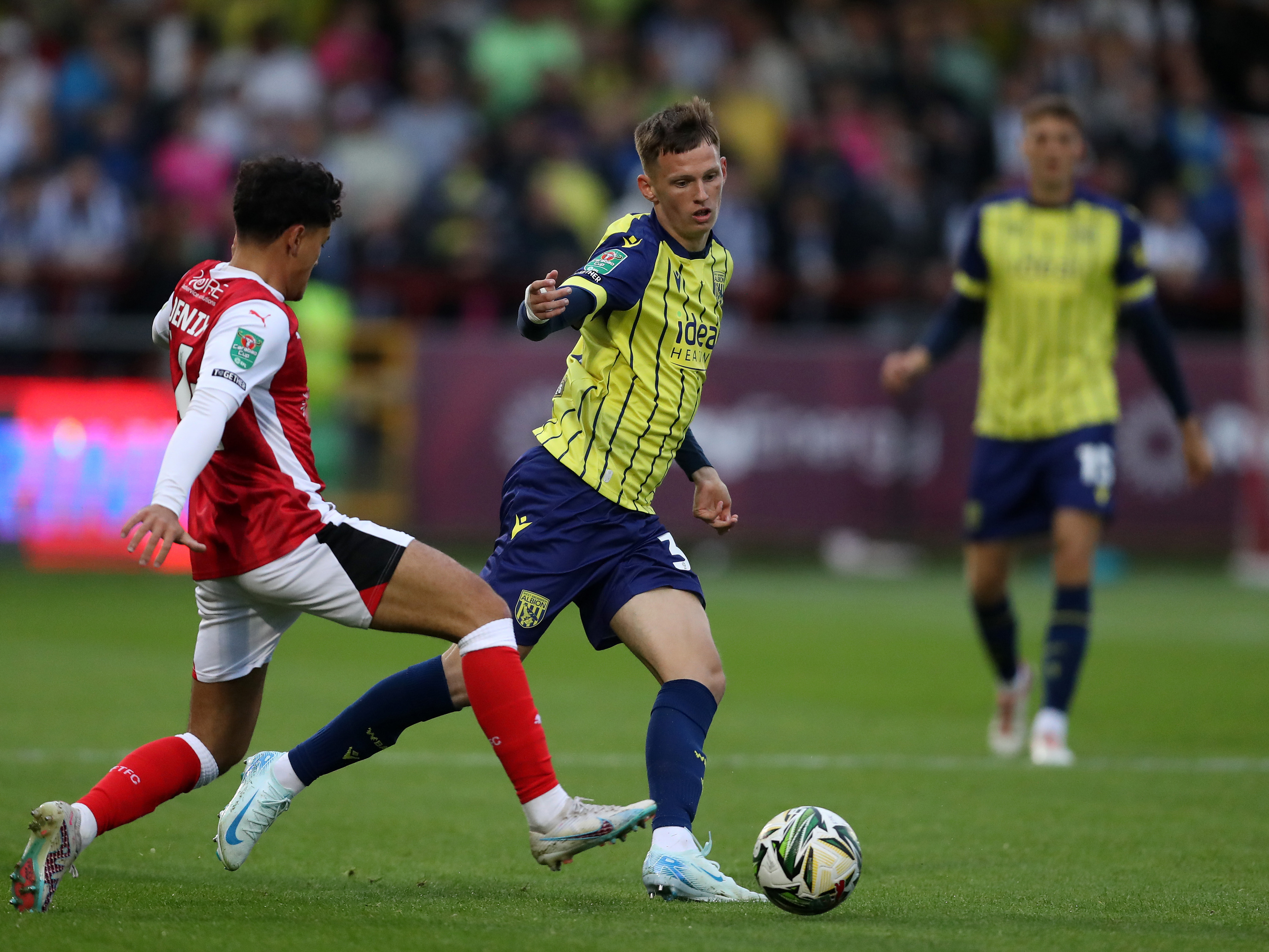 A photo of U21 defender Reece Hall in the 2024/25 yellow away kit