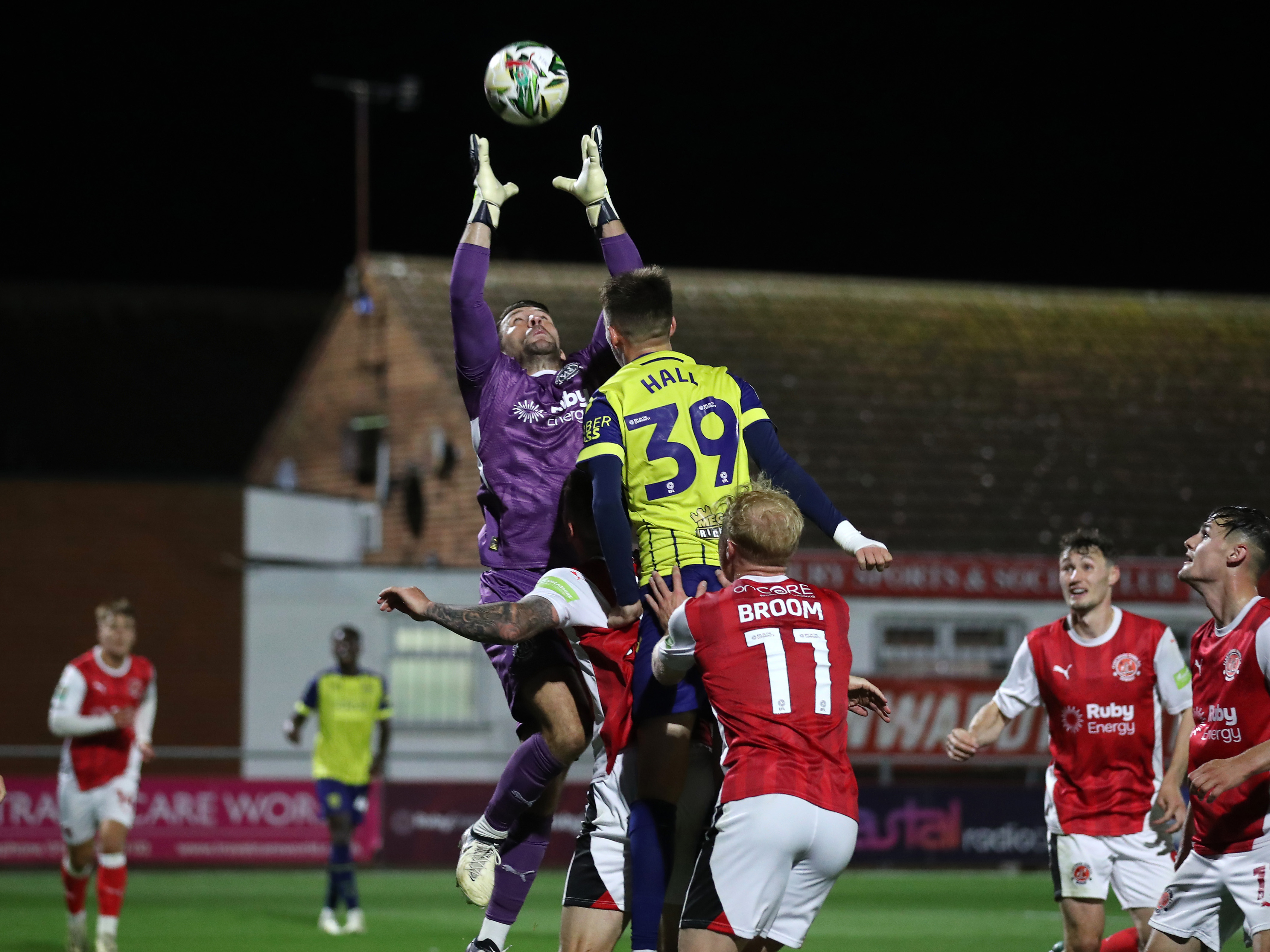 A photo of U21 defender Reece Hall in the 2024/25 yellow away kit