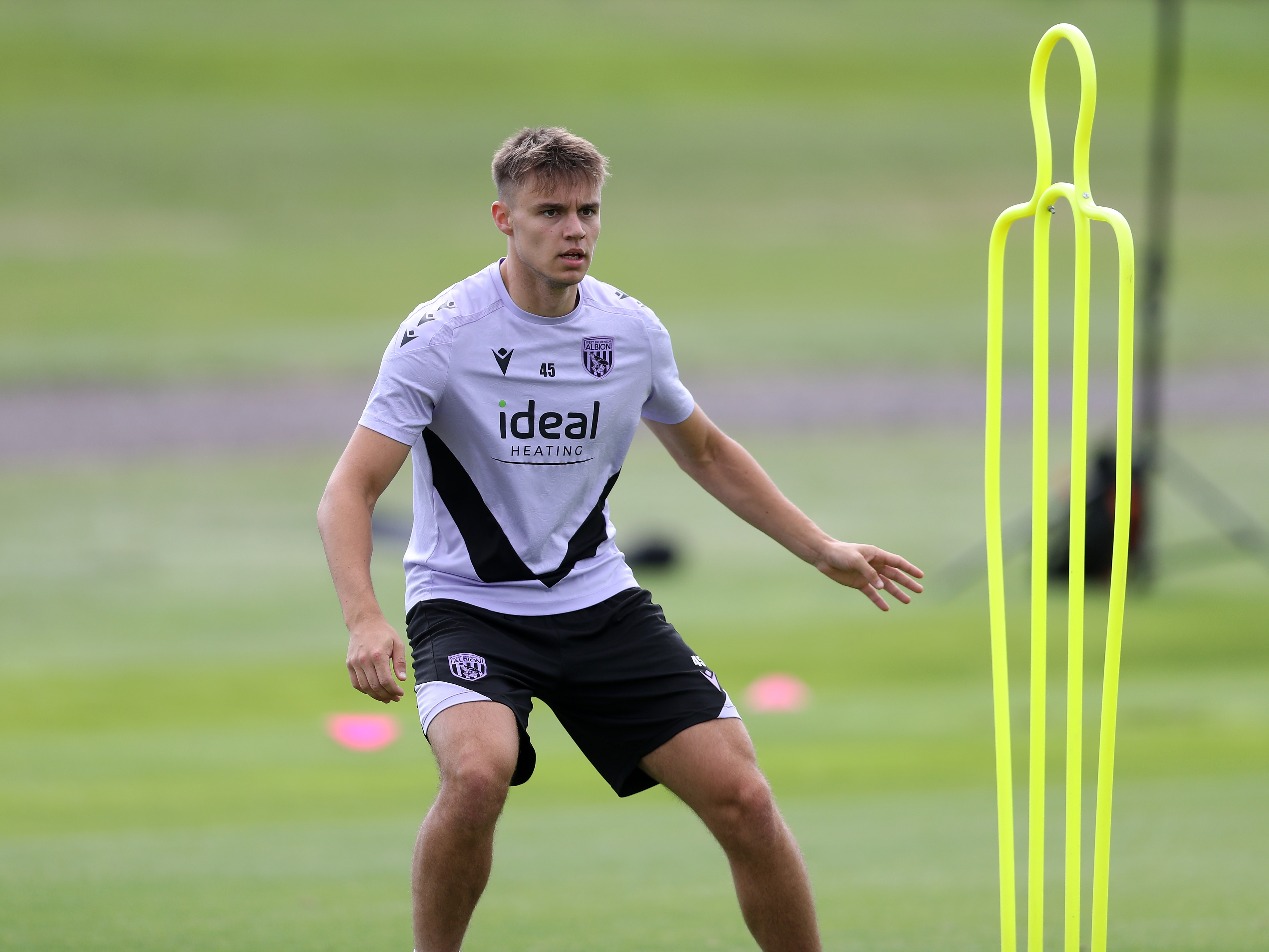 A photo of Albion U21 defender Evan Humphries in the purple 2024/25 training kit