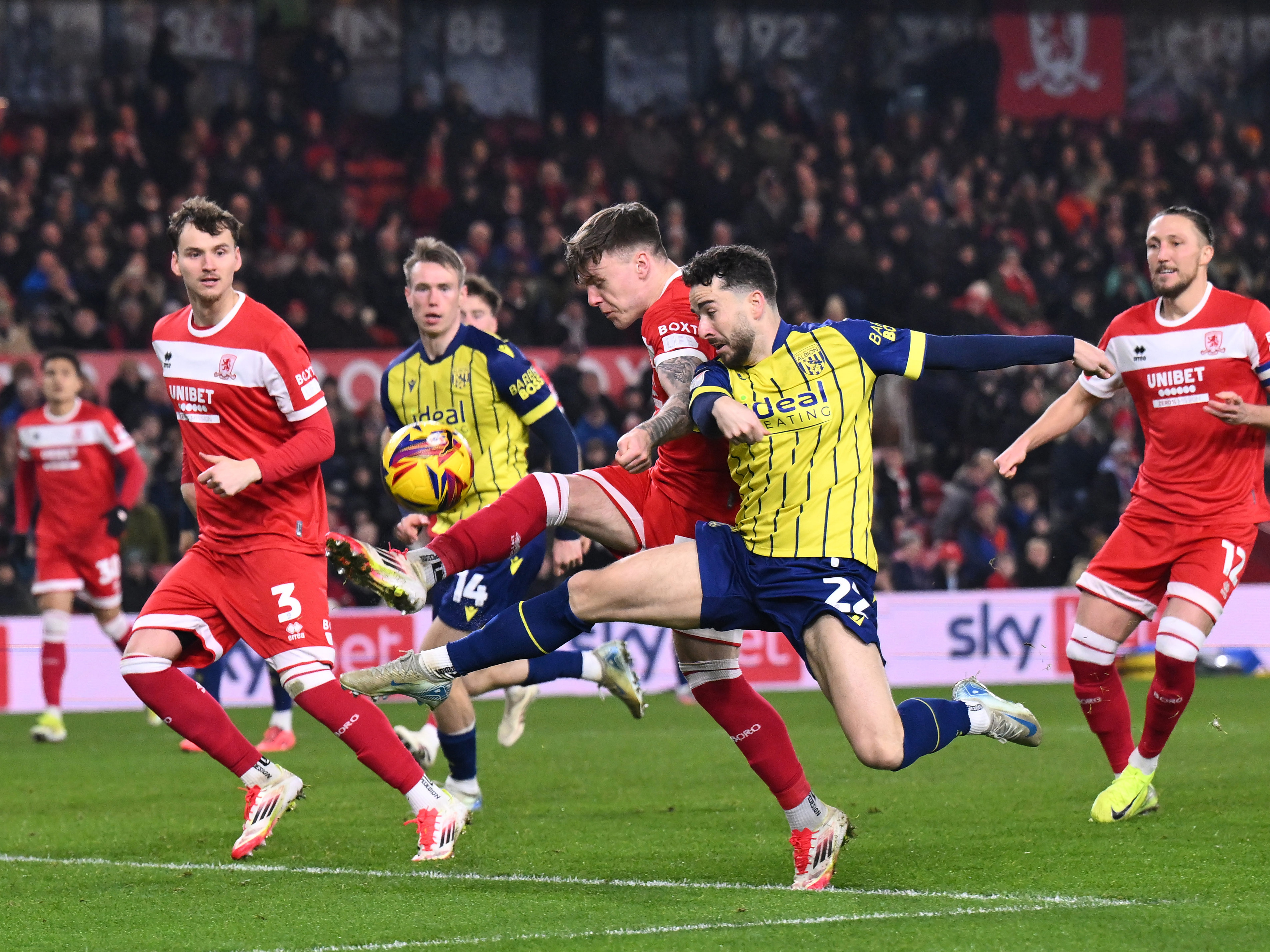 An image of Mikey Johnston battling for the ball at Middlesbrough