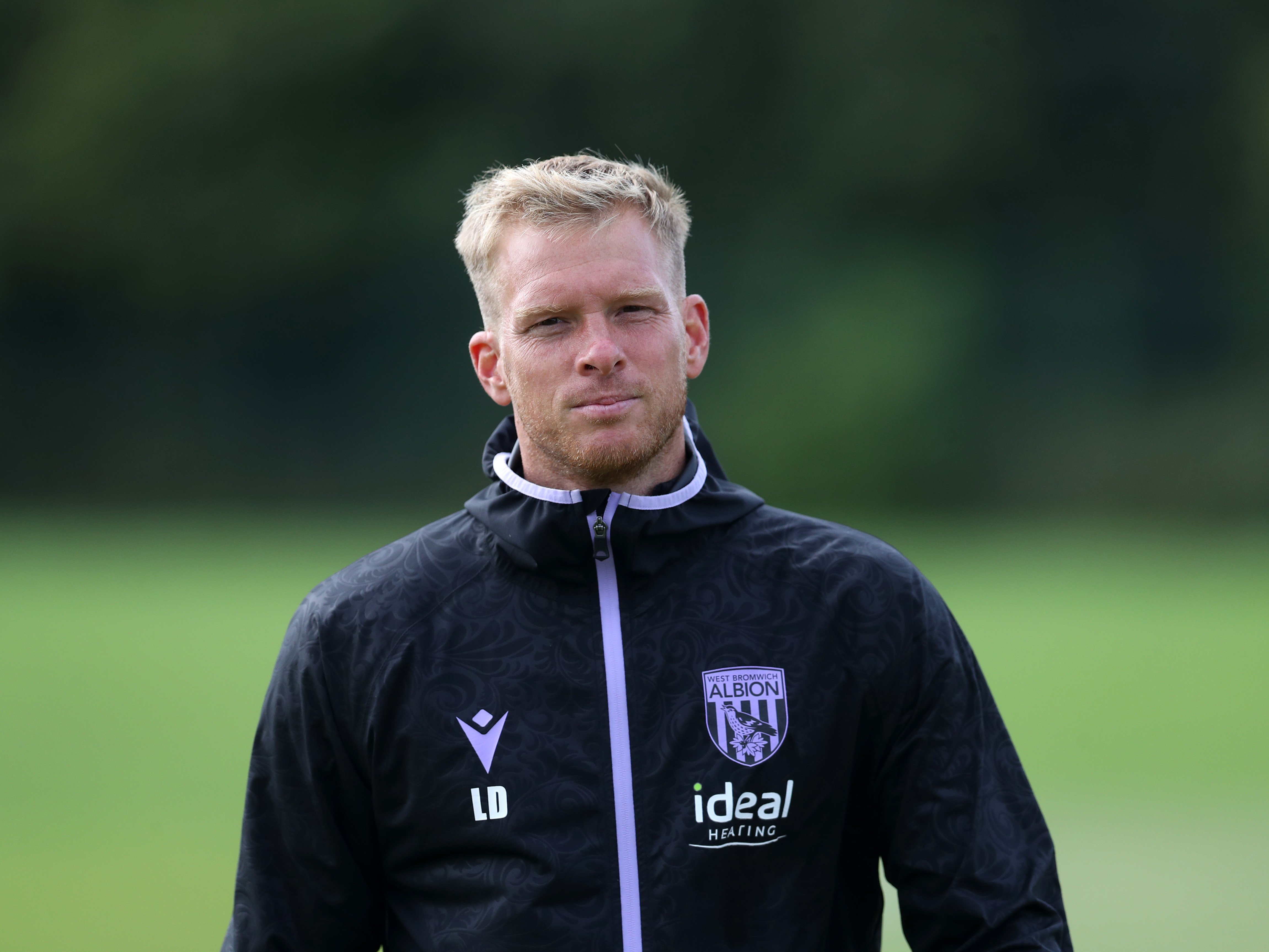 A photo of U18 boss Leigh Downing in the 2024/25 purple coaching training wear