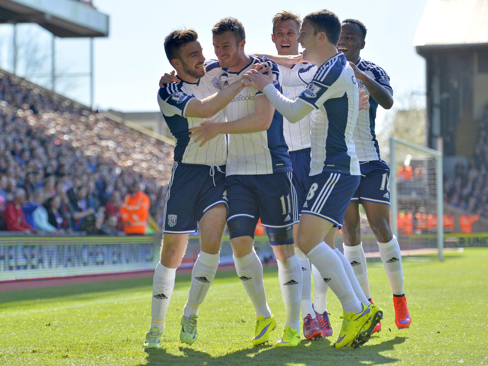 James Morrison and Chris Brunt celebrate with teammates.