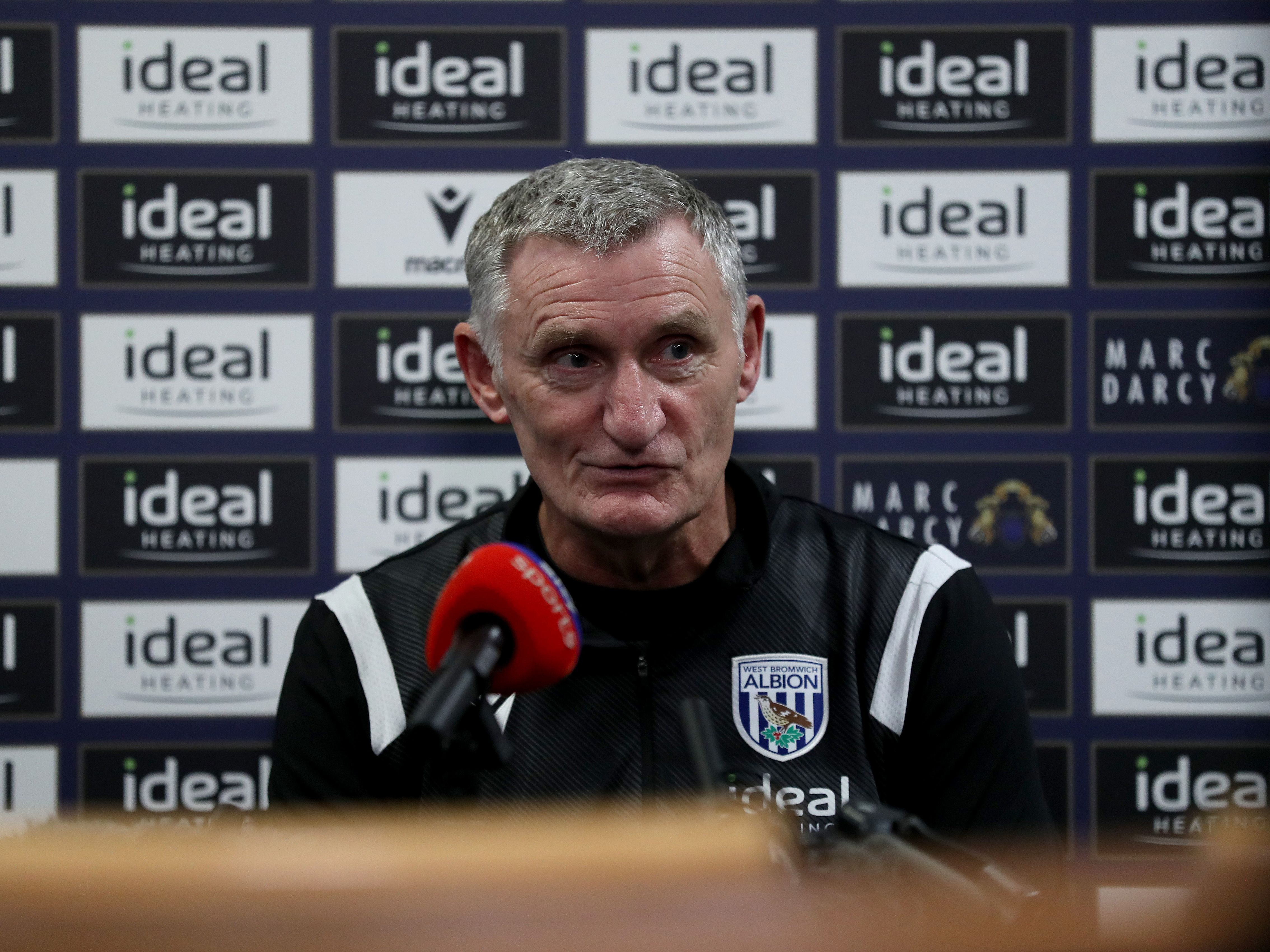 An image of Tony Mowbray in a press conference