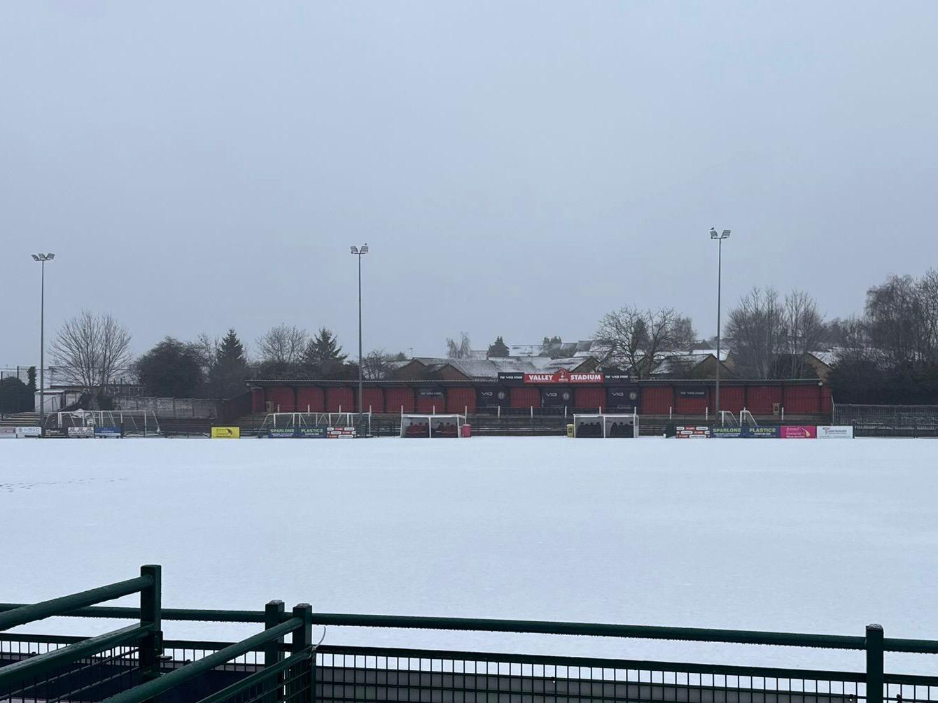 An image of the Valley Stadium covered in snow