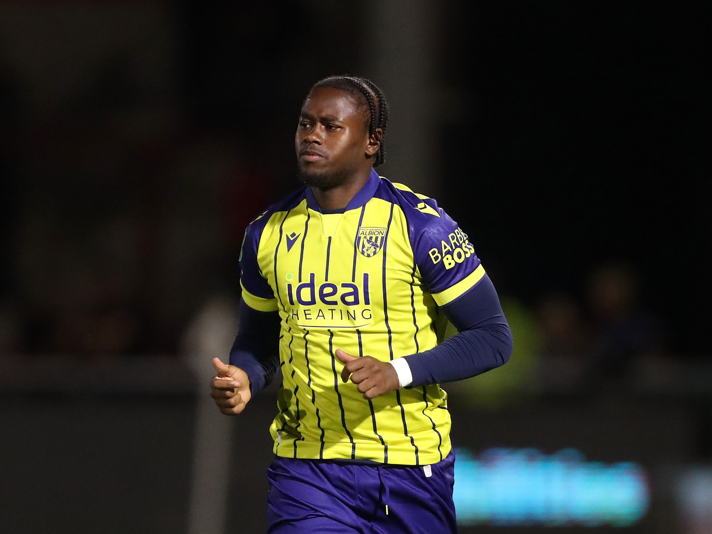 An image of Reyes Cleary in Albion's yellow and blue away kit