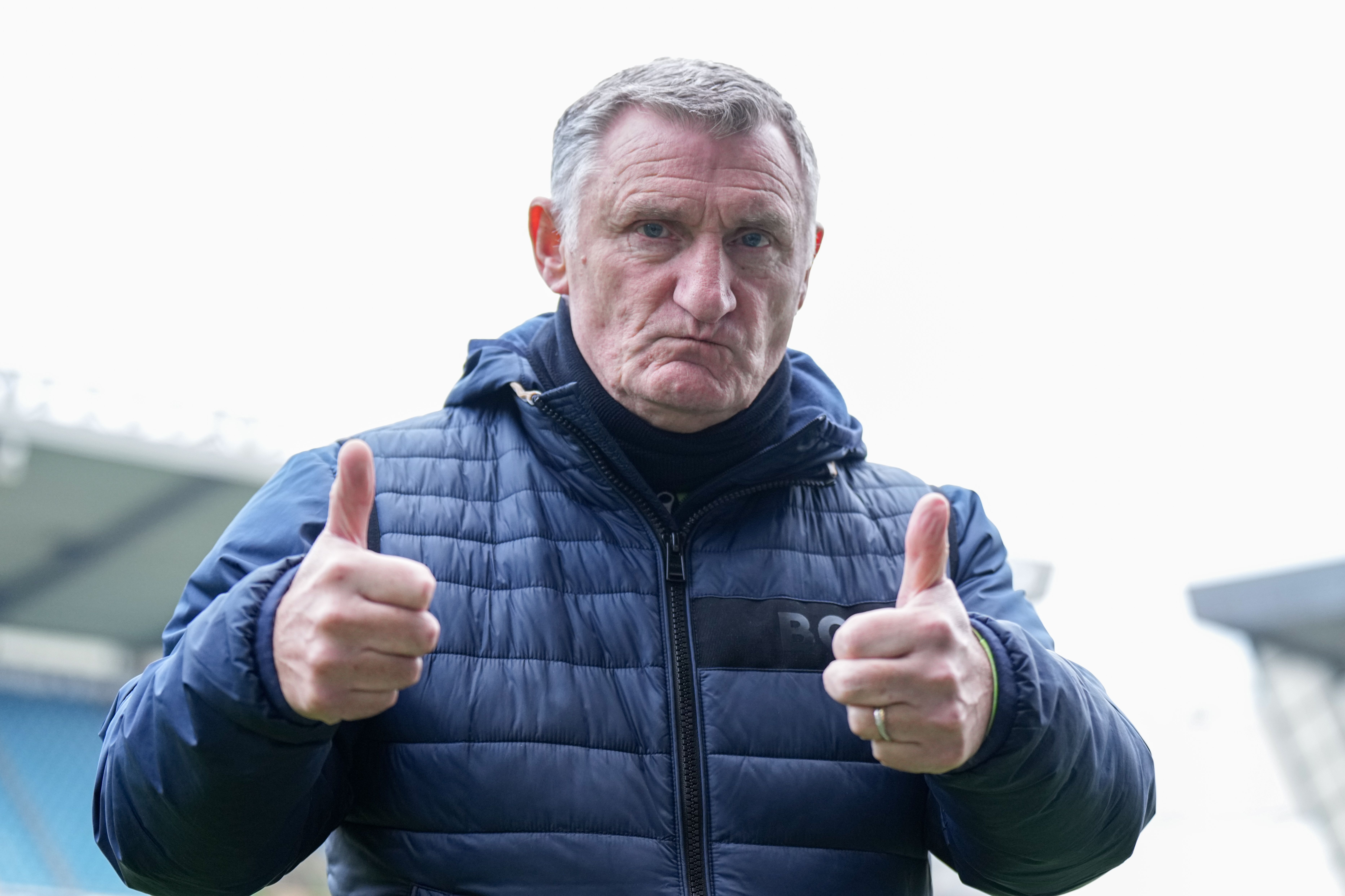 Tony Mowbray with his thumbs up to the camera 