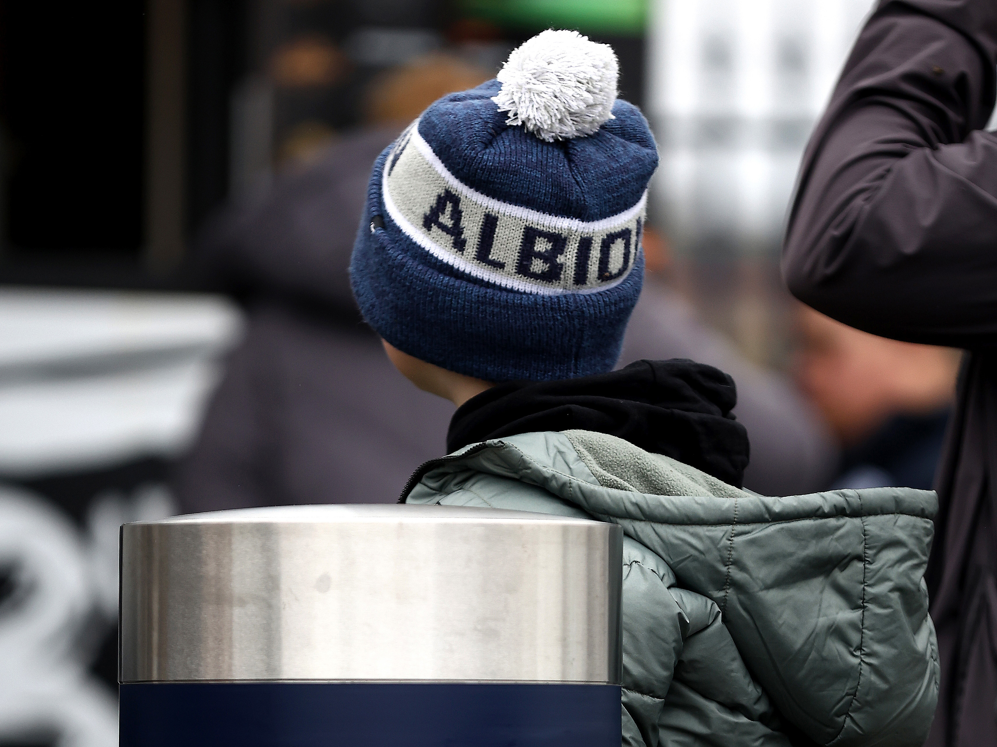 A young WBA fans with an Albion hat on