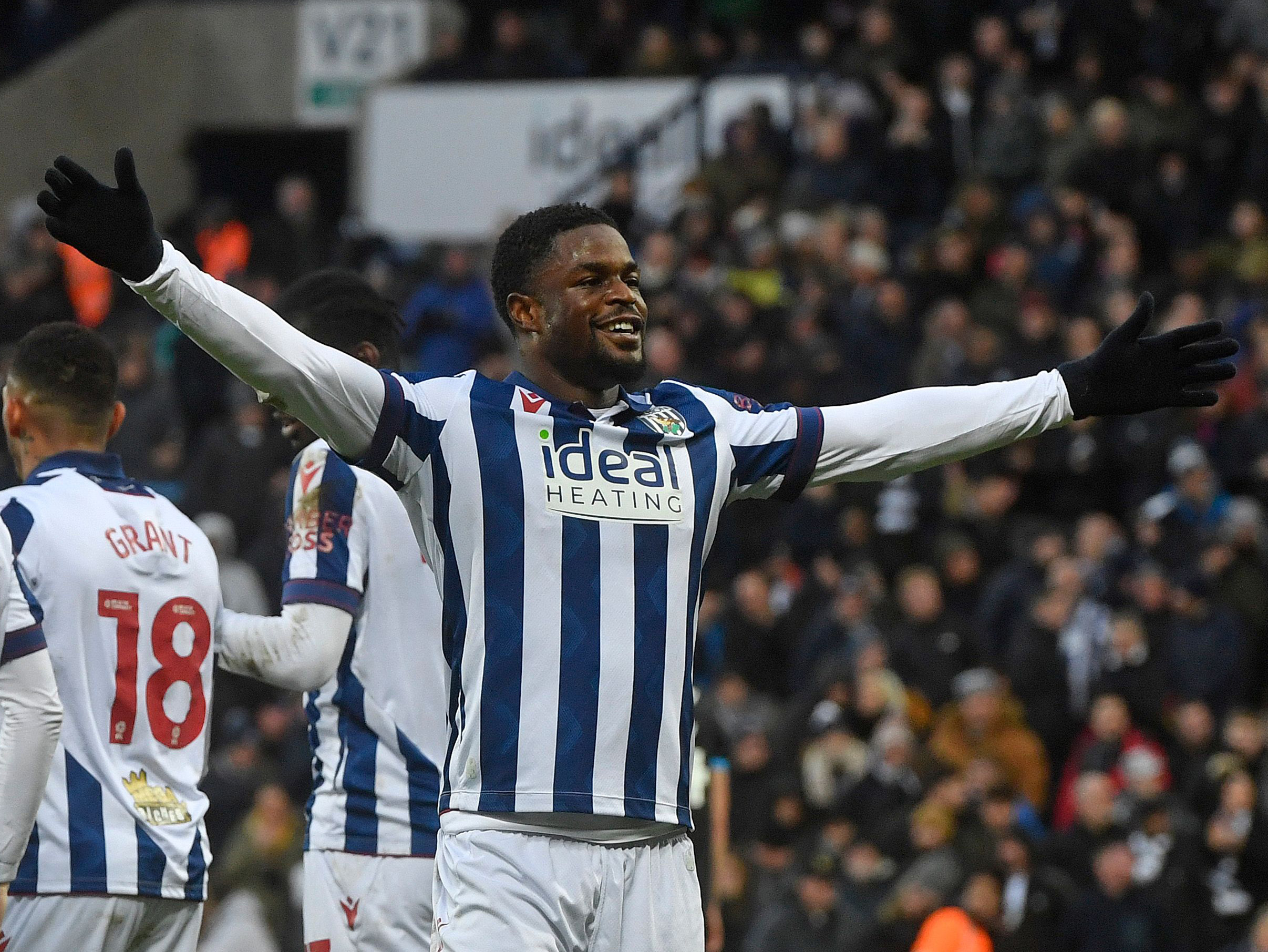 Josh Maja celebrates his goal against Preston at The Hawthorns in the home kit 