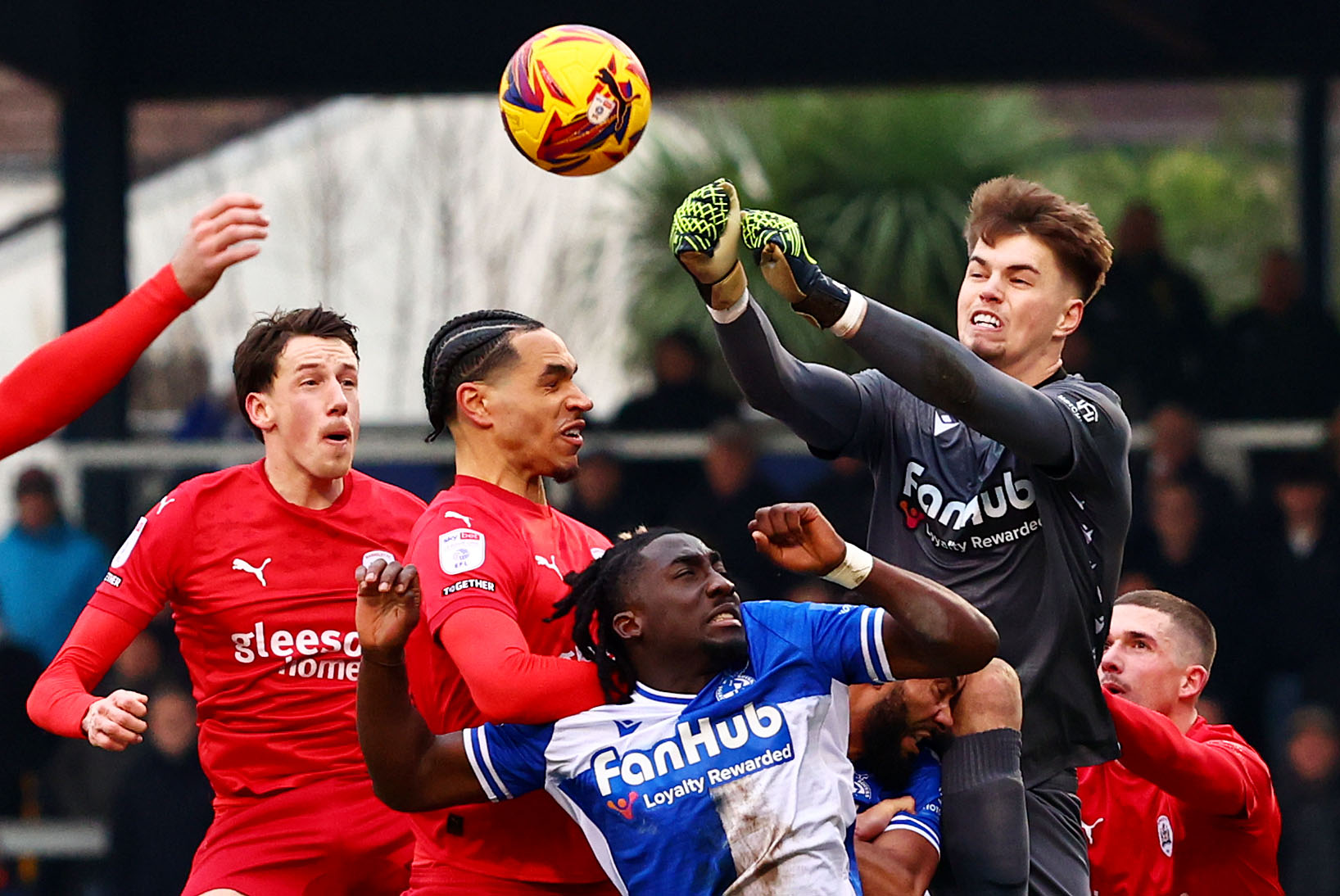 Josh Griffiths punching the ball away against Barnsley 