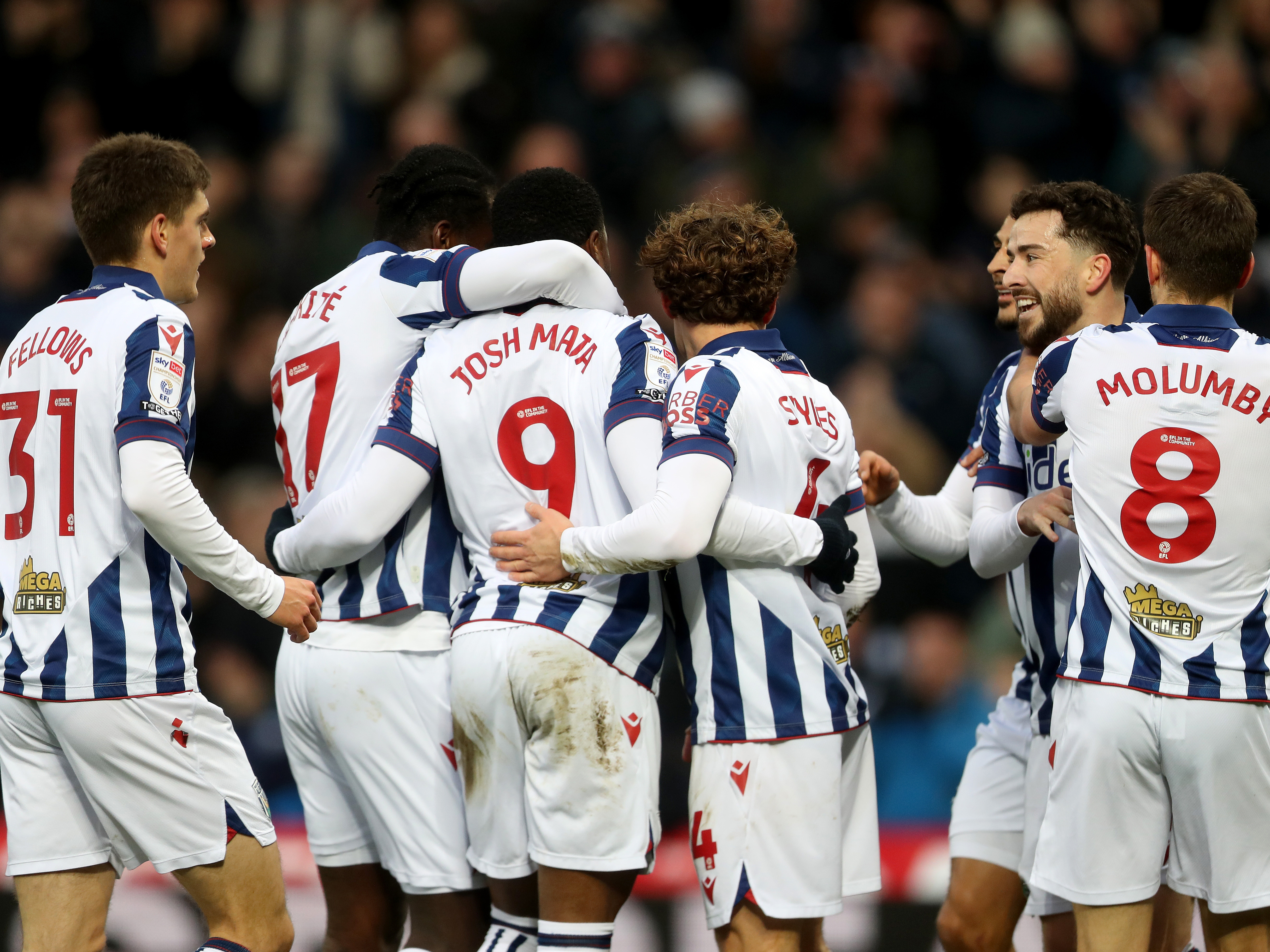 An image of Josh Maja and his teammates celebrating a goal against Preston