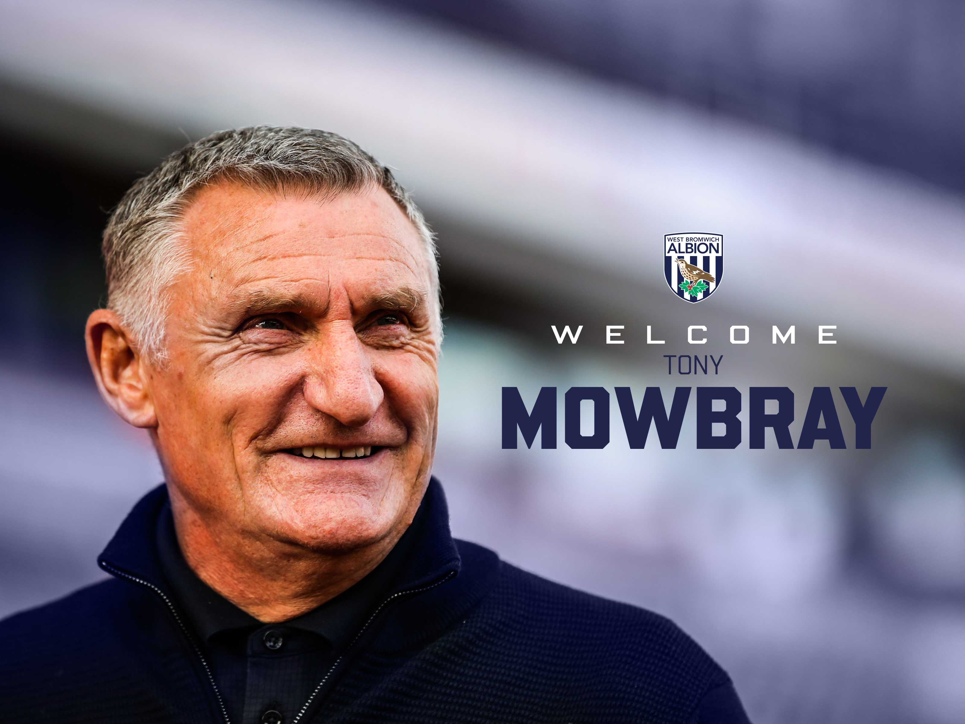 A picture of Tony Mowbray smiling with the words "welcome Tony Mowbray" written on with a WBA badge 