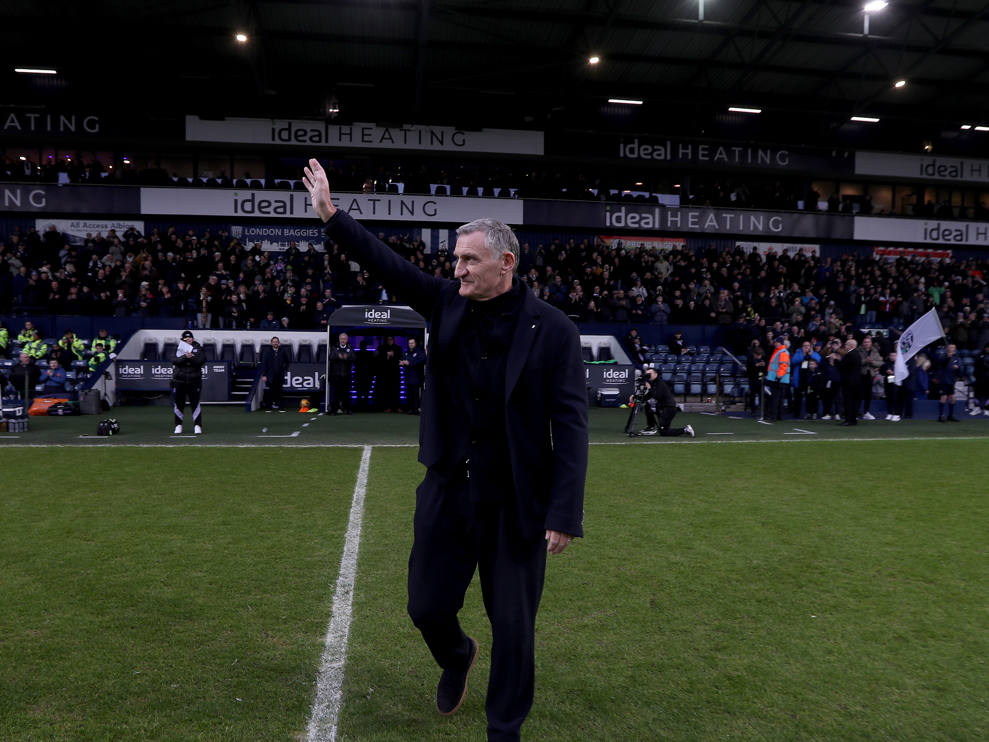 An image of Tony Mowbray waving to The Hawthorns crowd