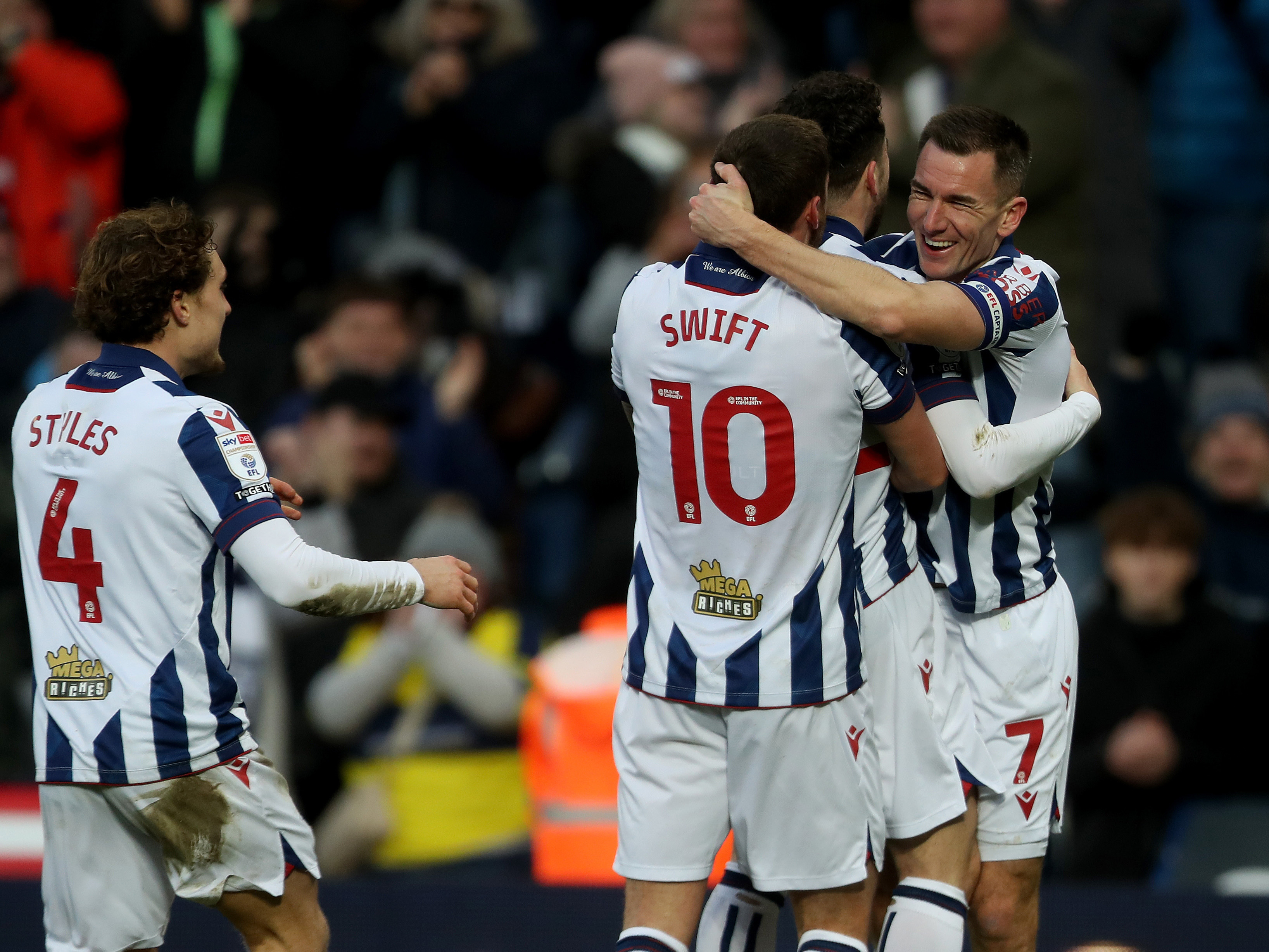 An image of Jed Wallace celebrating a goal with his teammates