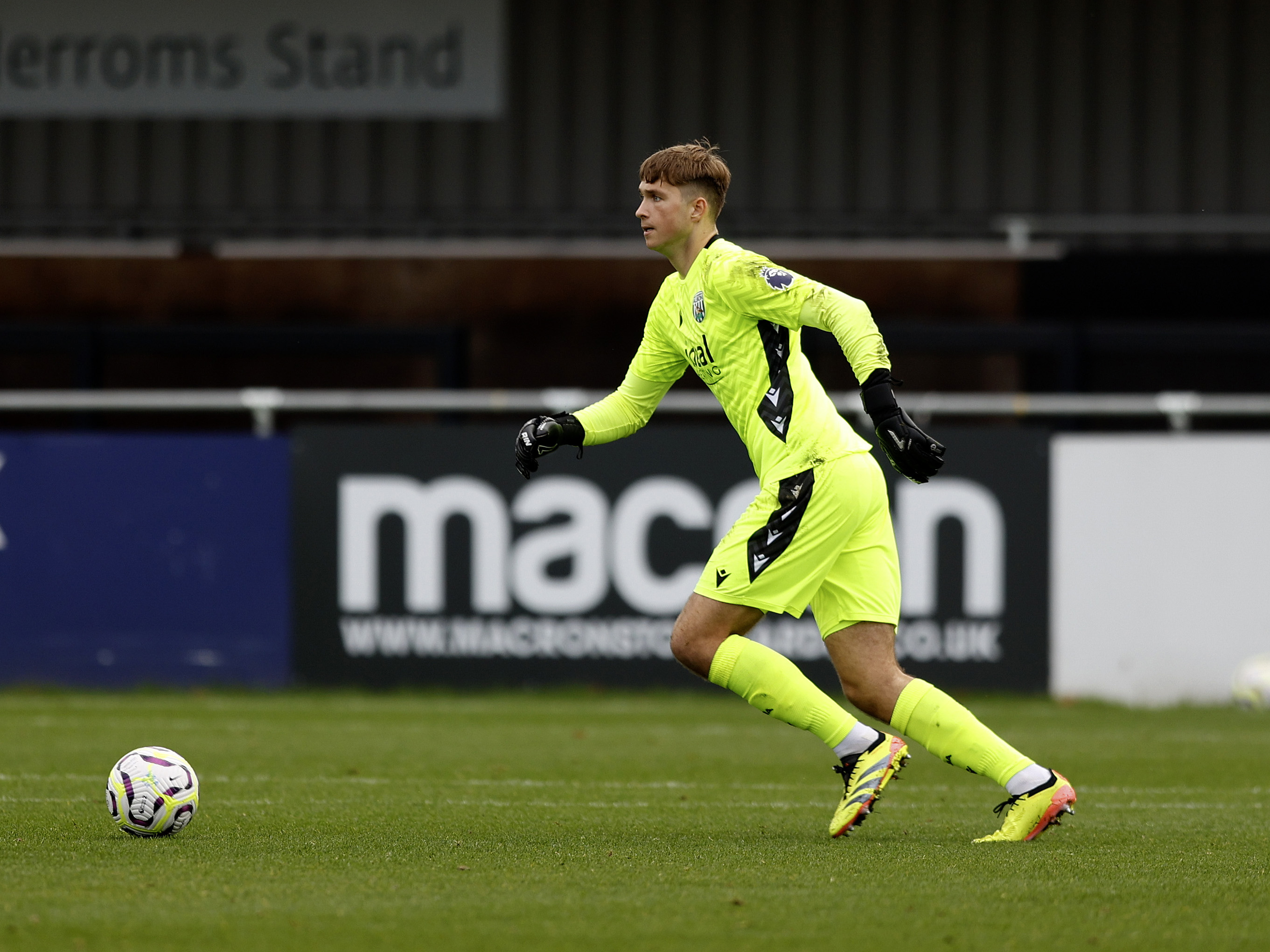 A photo of Albion U21 goalkeeper Joe Wallis in the 2024/25 yellow keeper kit