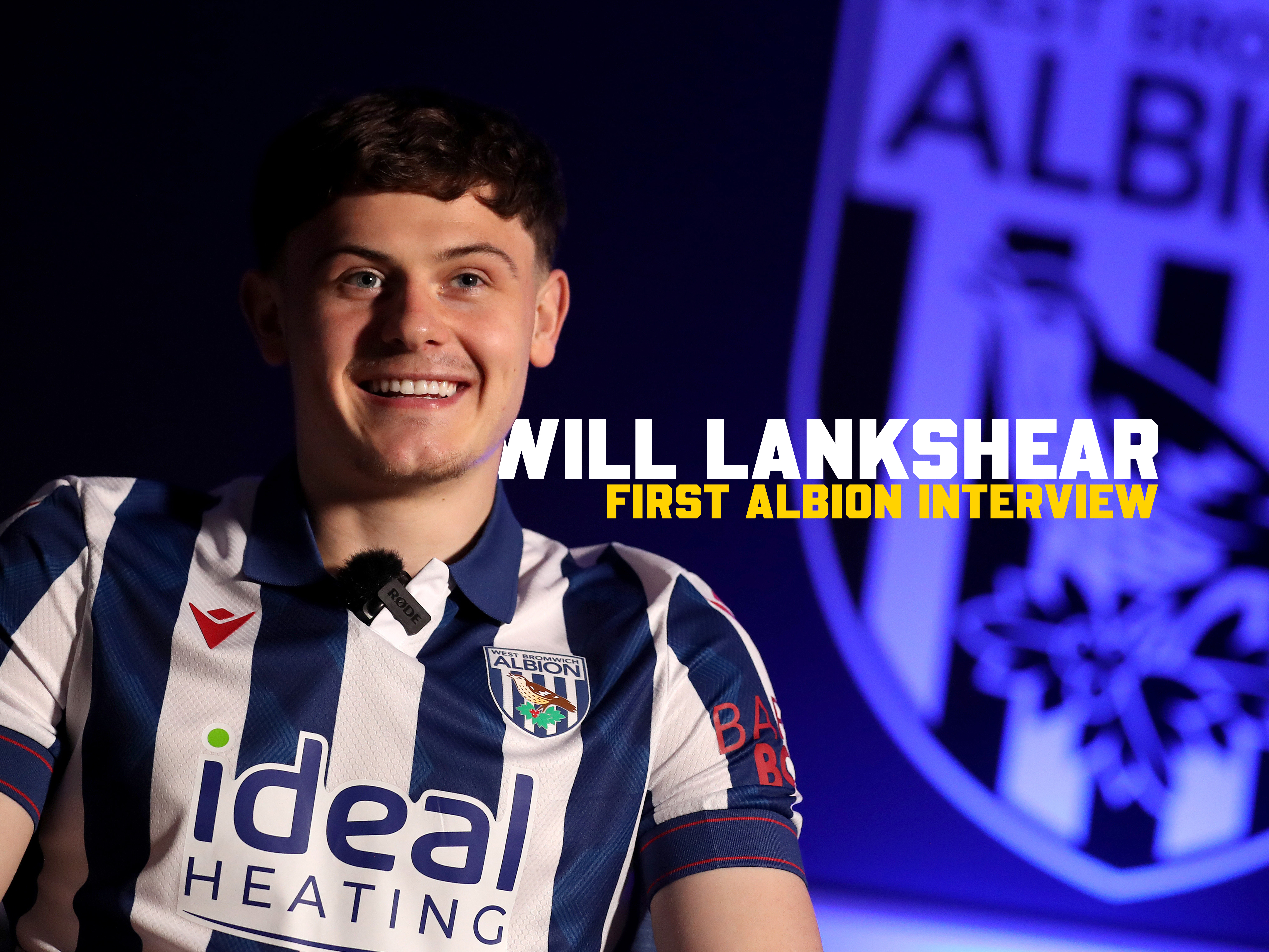 Will Lankshear is interviewed by WBA TV while sat in a home shirt 