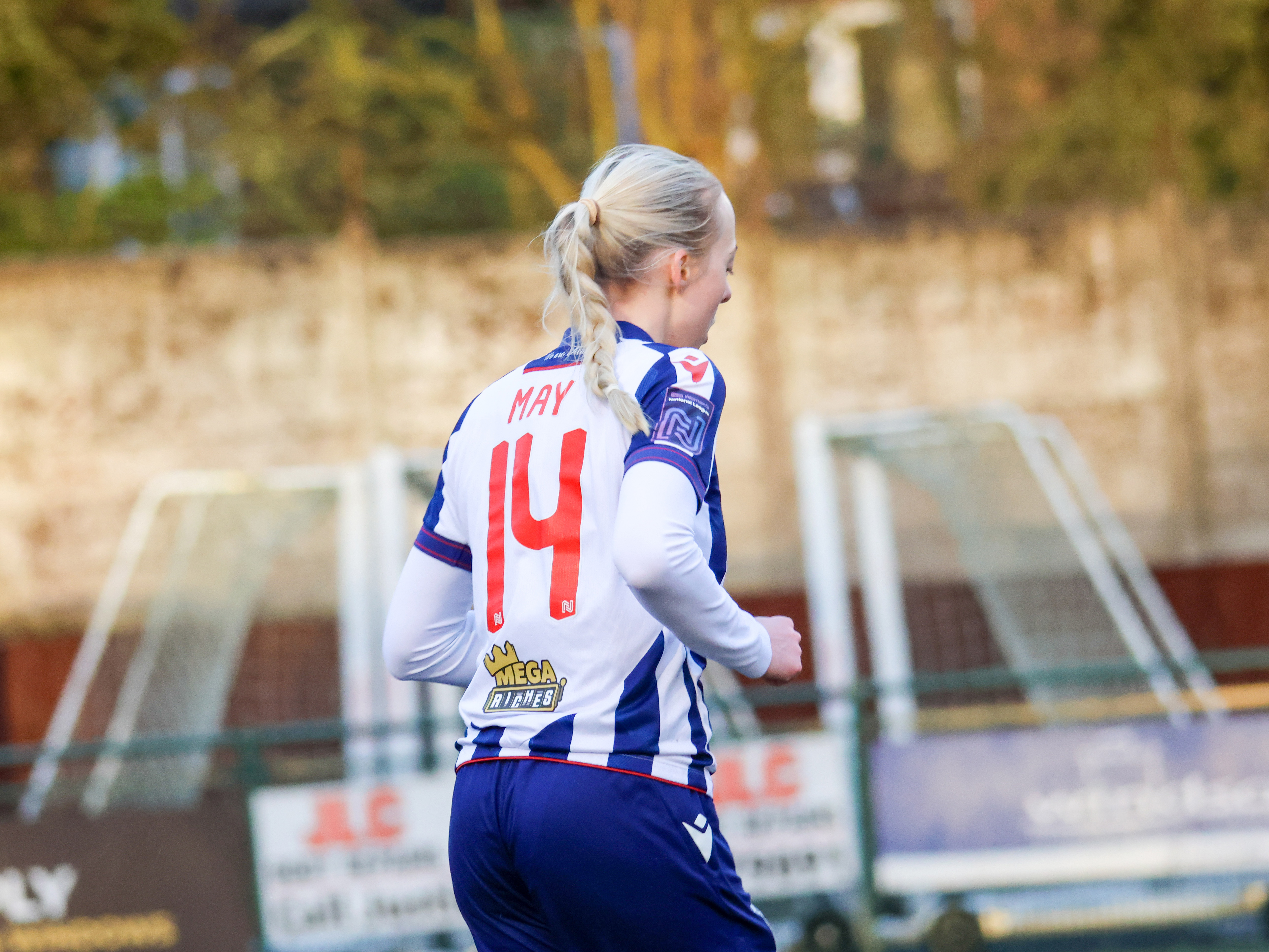 Ellie May in action for Albion Women in the home kit 