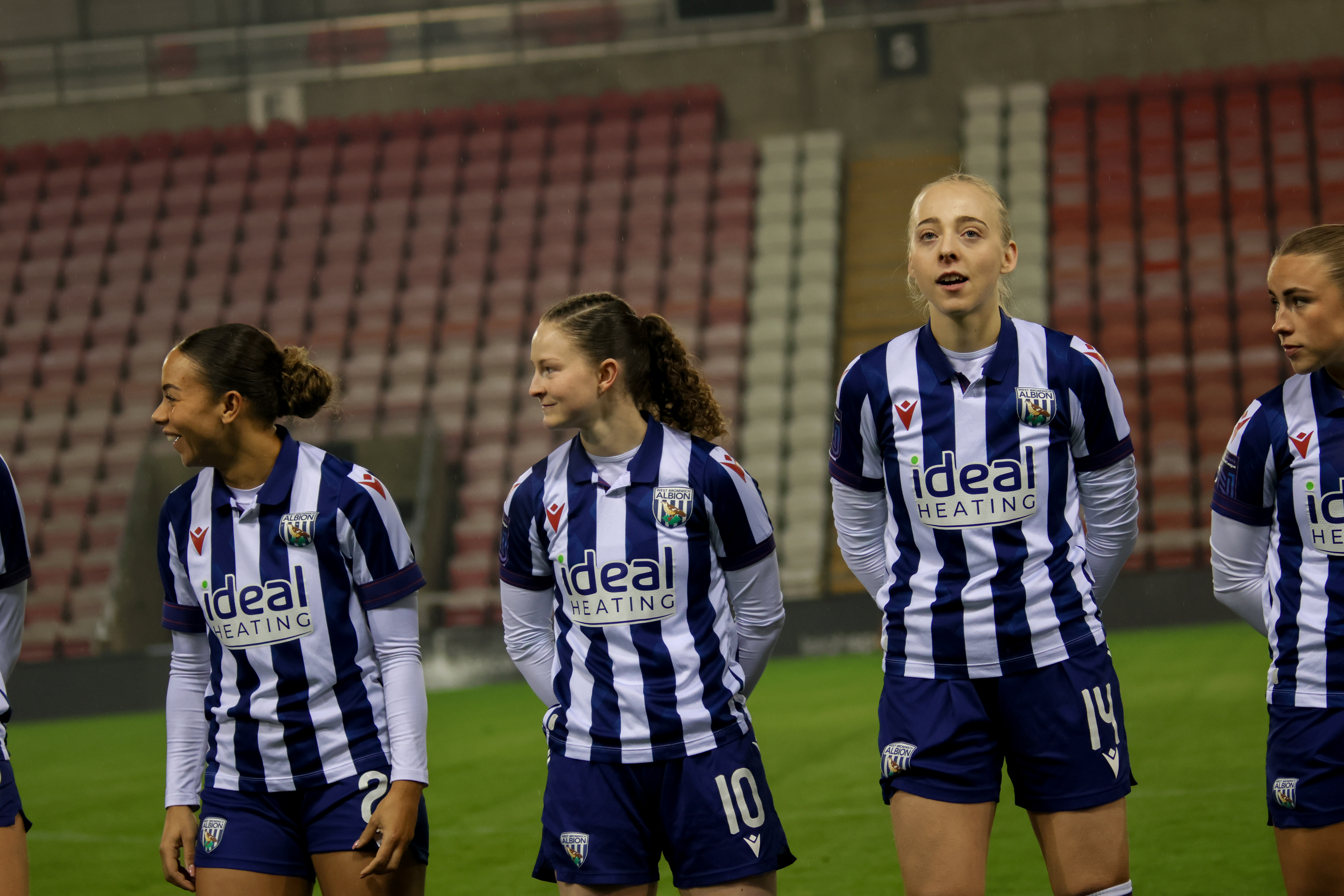 Olivia Rabjohn lining up with team-mates in the home kit before a game