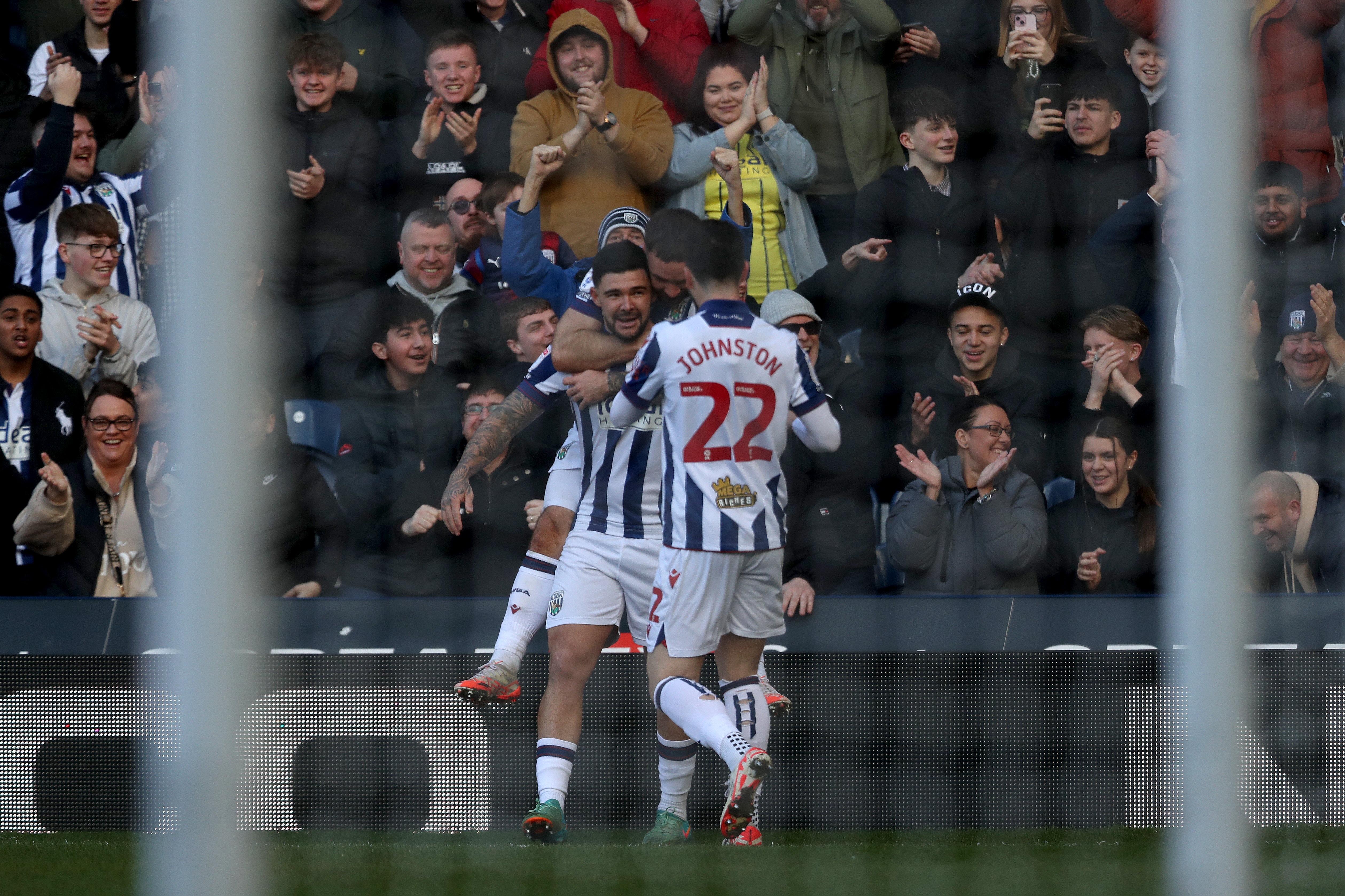 Alex Mowatt celebrates scoring against Oxford at The Hawthorns 