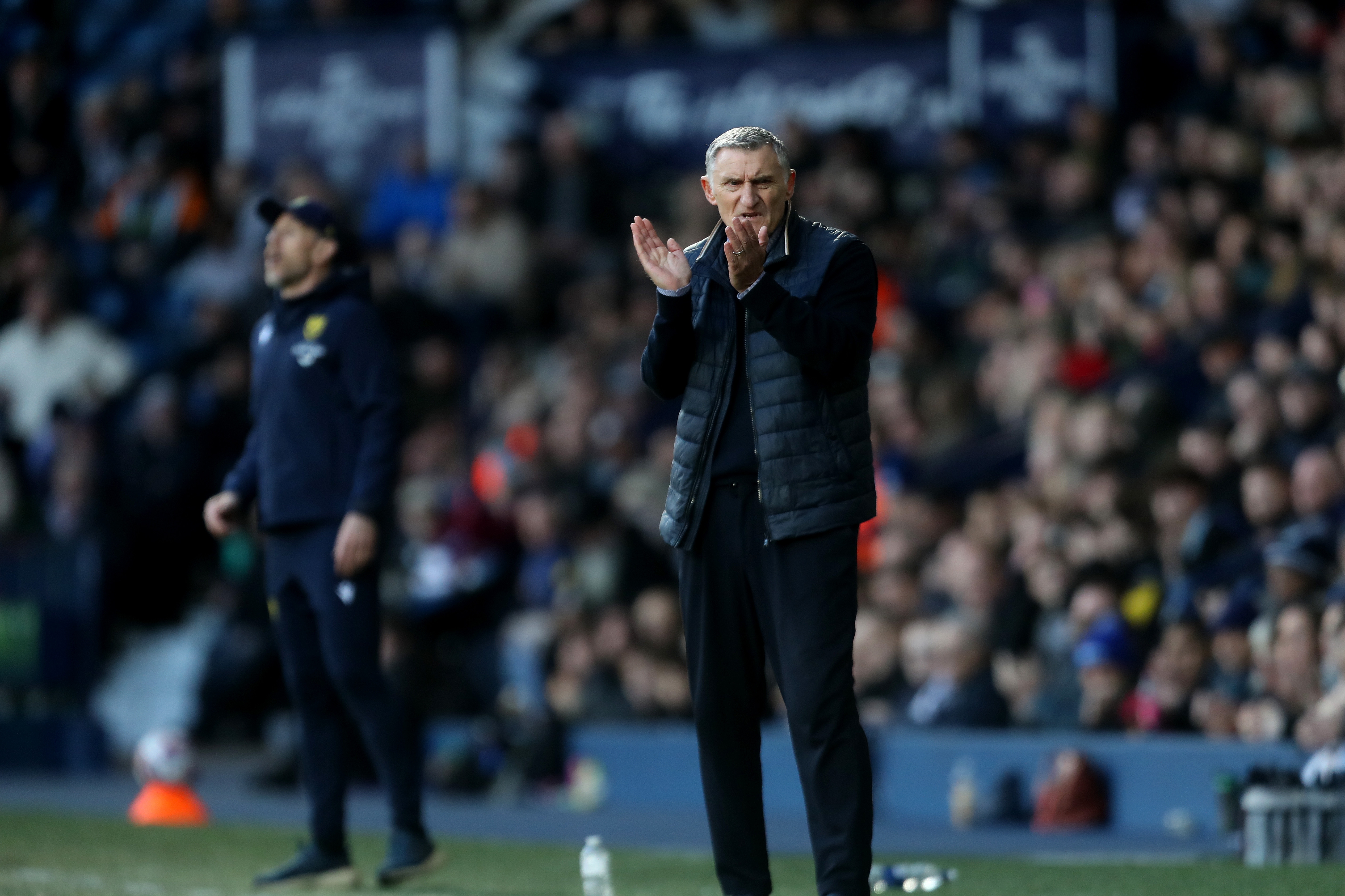 Tony Mowbray applauding at the side of the pitch against Oxford 