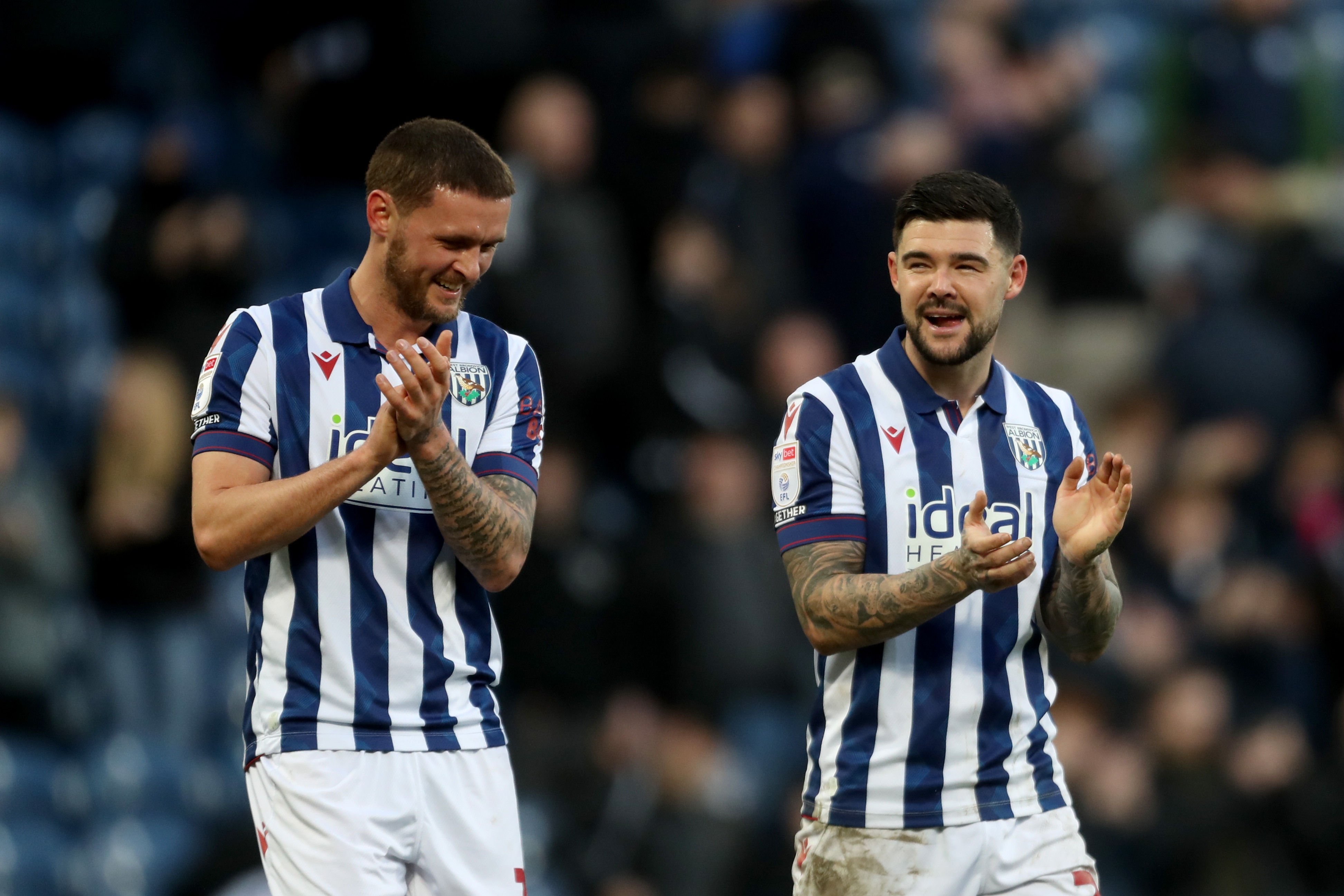 John Swift and Alex Mowatt applauding Albion fans after the Oxford game