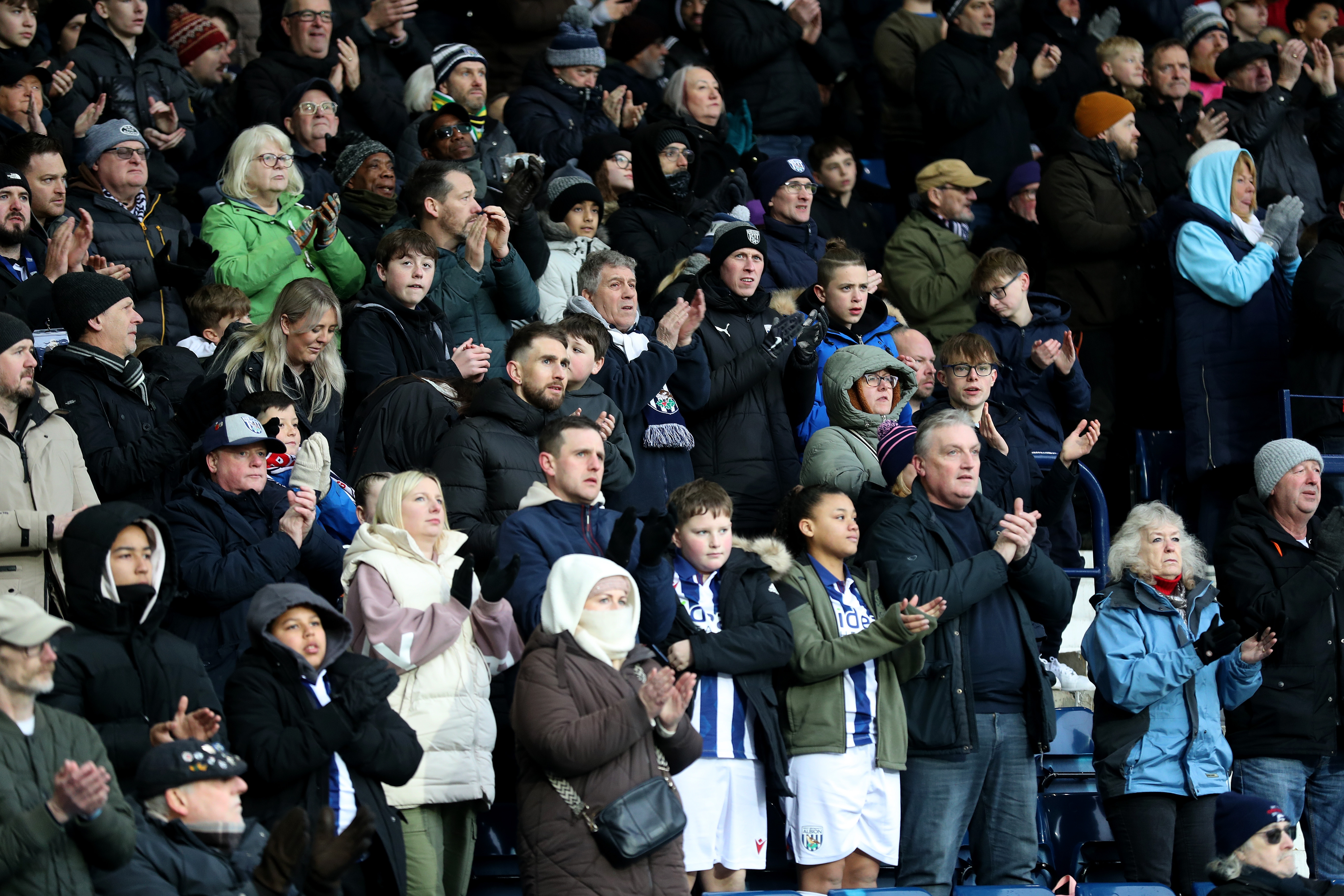 Albion fans applauding in the stand