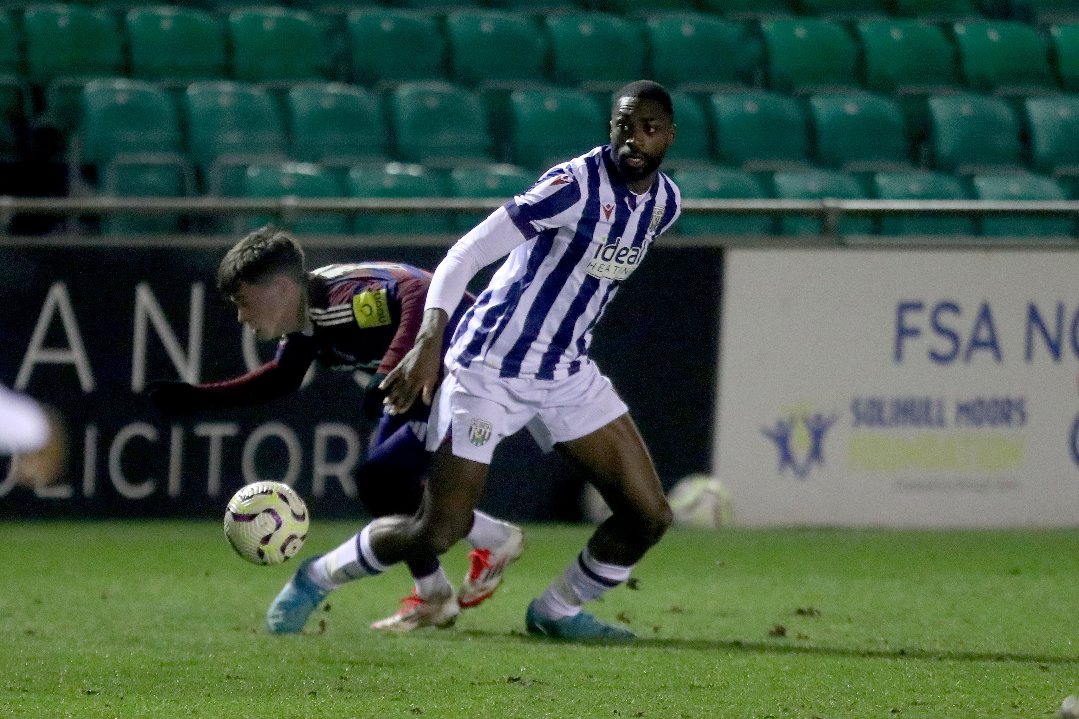 Semi Ajayi in action for Albion's PL2 team in the home kit 