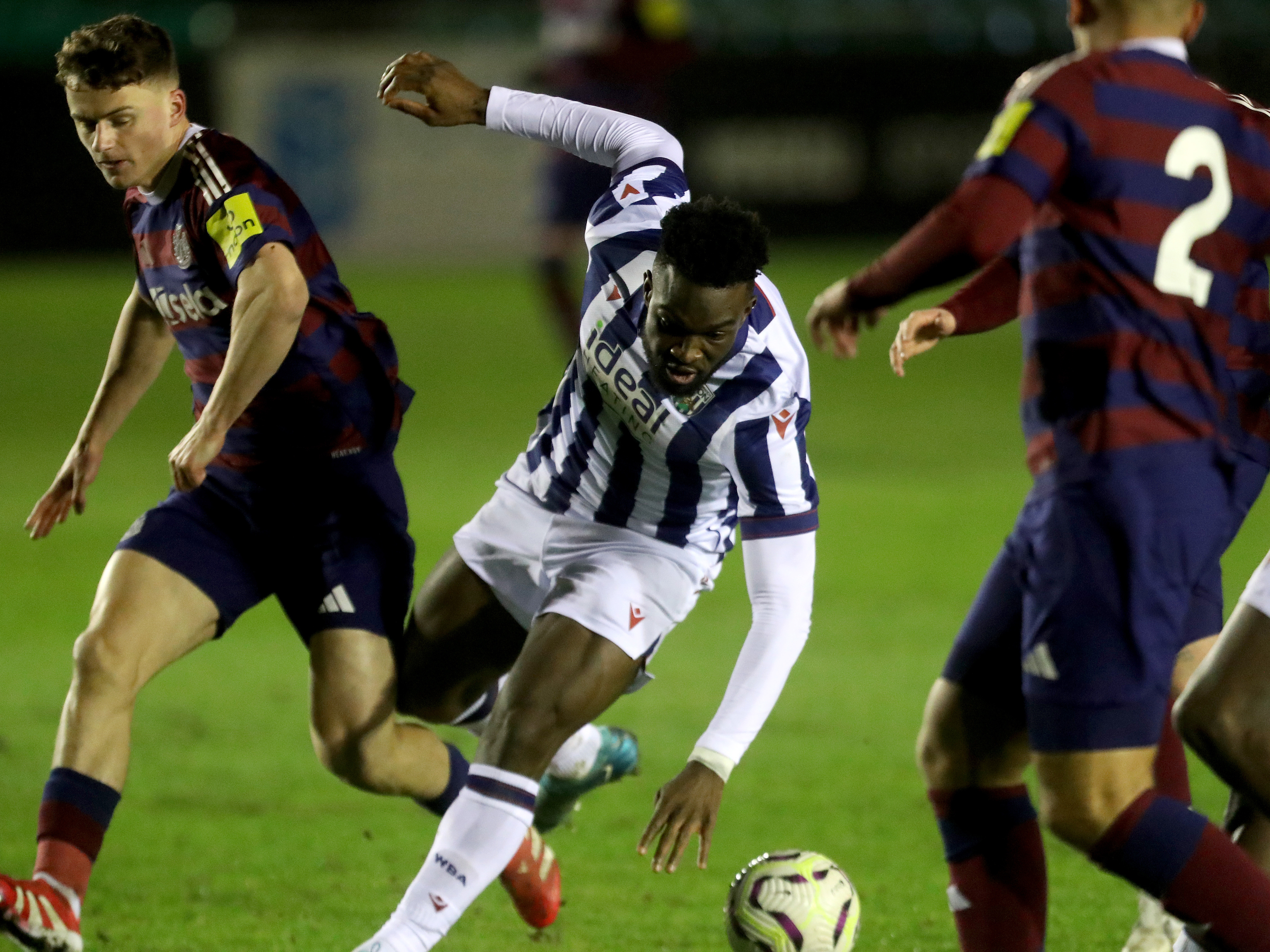 Daryl Dike in action for Albion's PL2 team in the home kit 