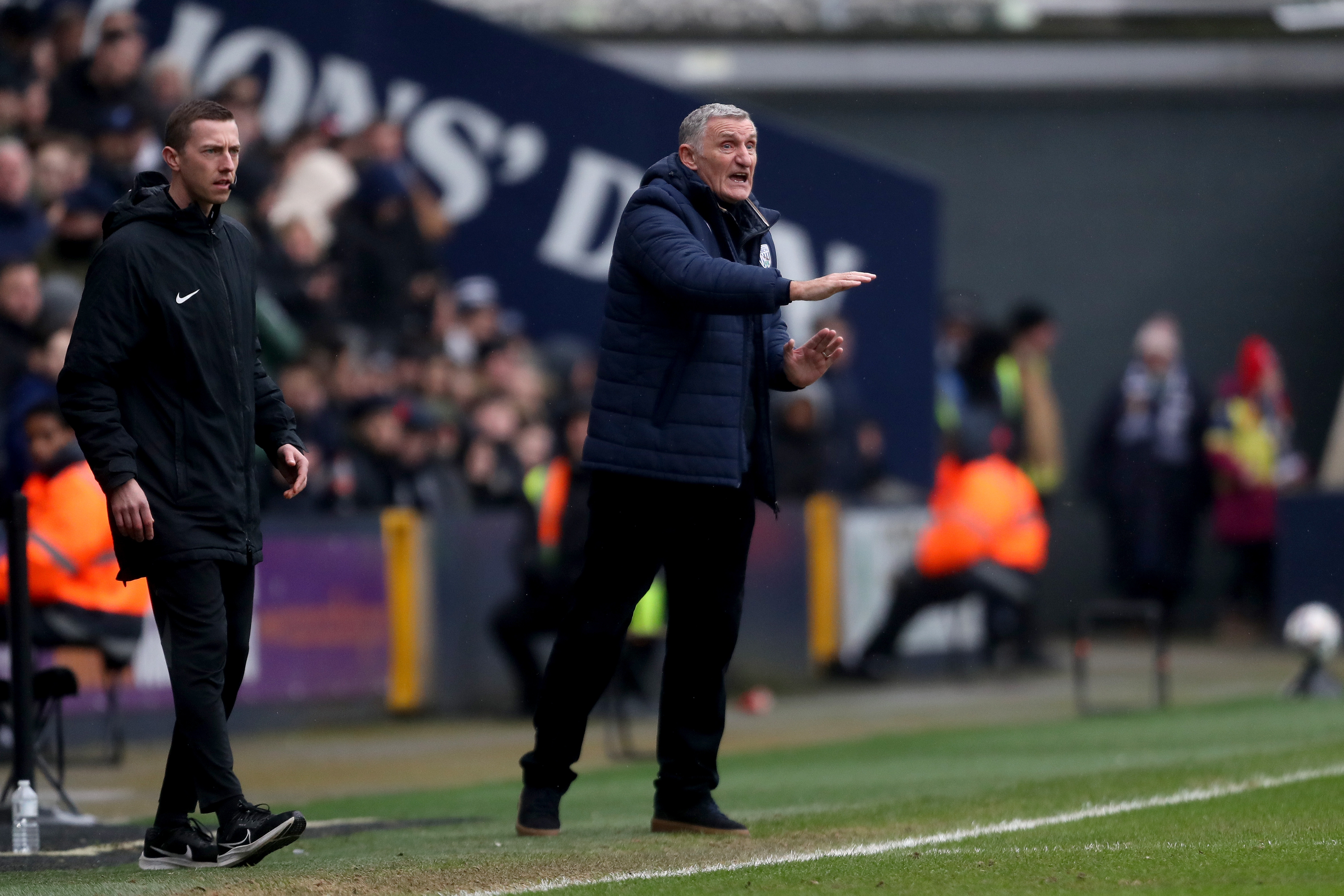 Tony Mowbray on the side of the pitch at Millwall